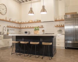  THE KITCHEN
• Movable and expandable 20-yard kitchen island
• Removable island stove
• Apothecary
• 3 working ovens, 2 stove tops, 2 dishwashers, commercial fridge, ice machine
• Shower and changing room
• Sound-proof doors, window
• Wireless audio system  