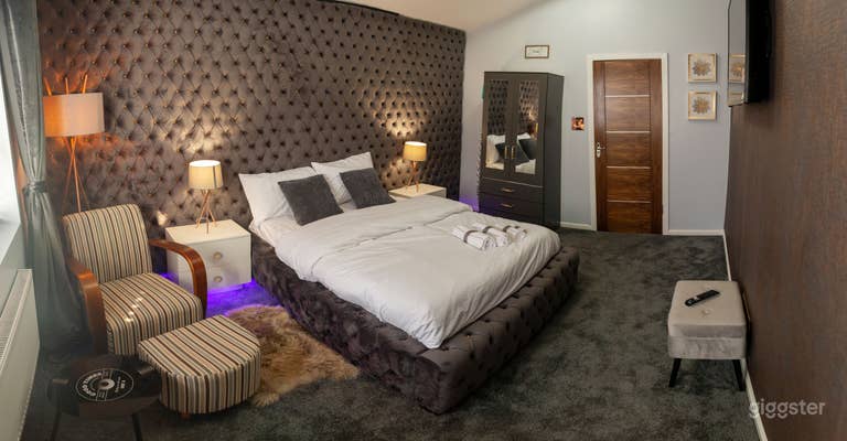  Beautifully styled bedroom in grey and copper features  