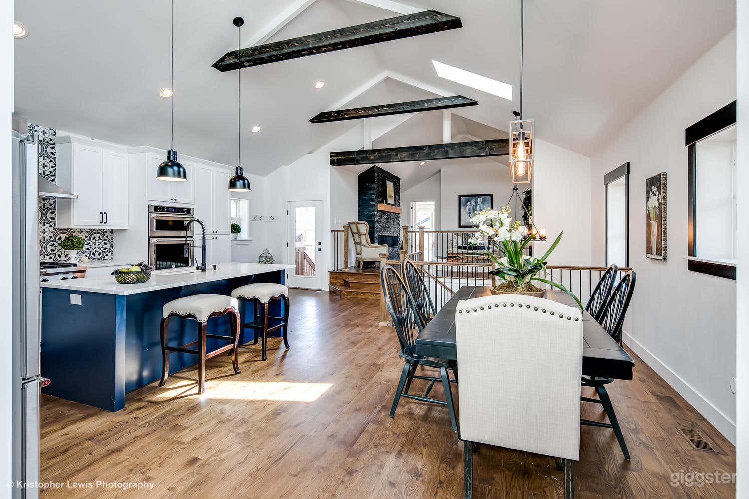 Large open space with exposed beams. Great natural light. Art work has been updated with furniture updates