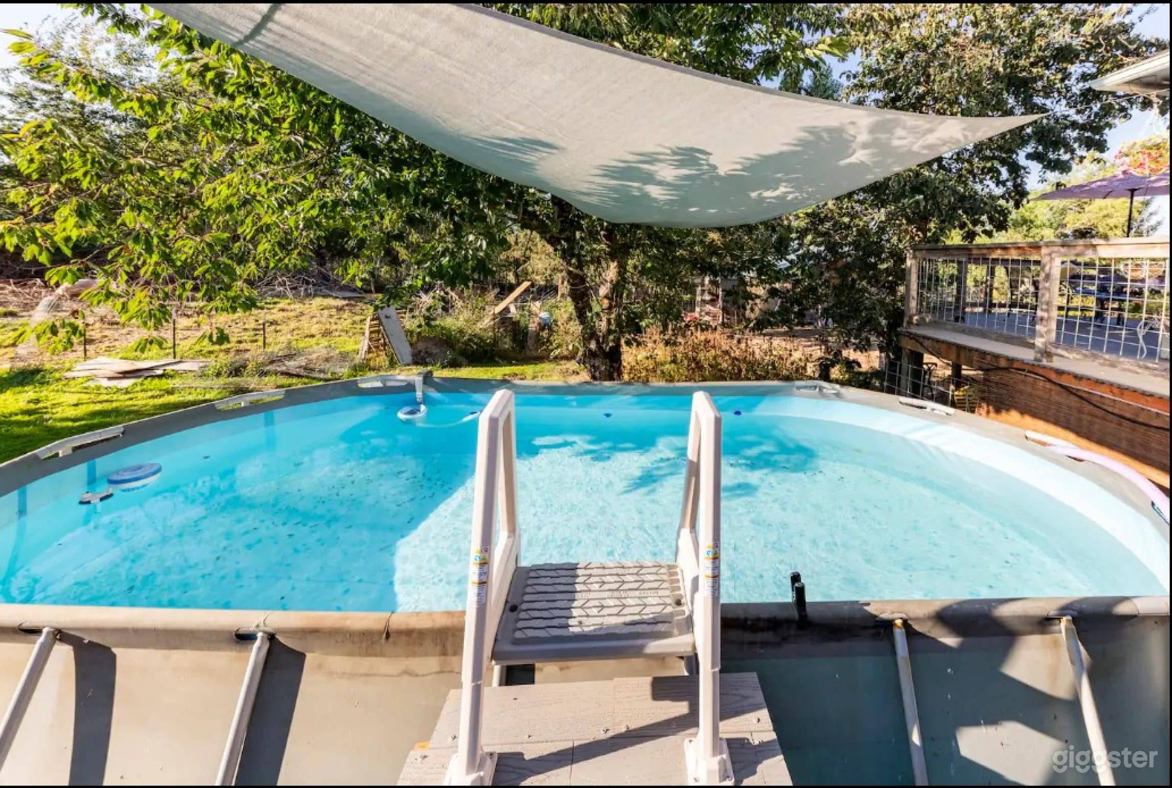 Picturesque Oasis Featuring A Stunning Pool With Deck Photo 2