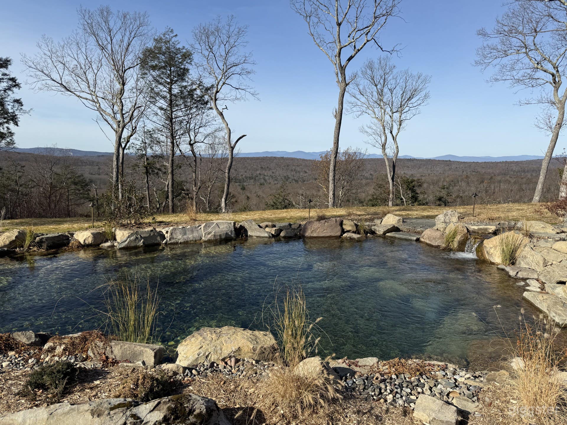 Pond with western view of mountains
