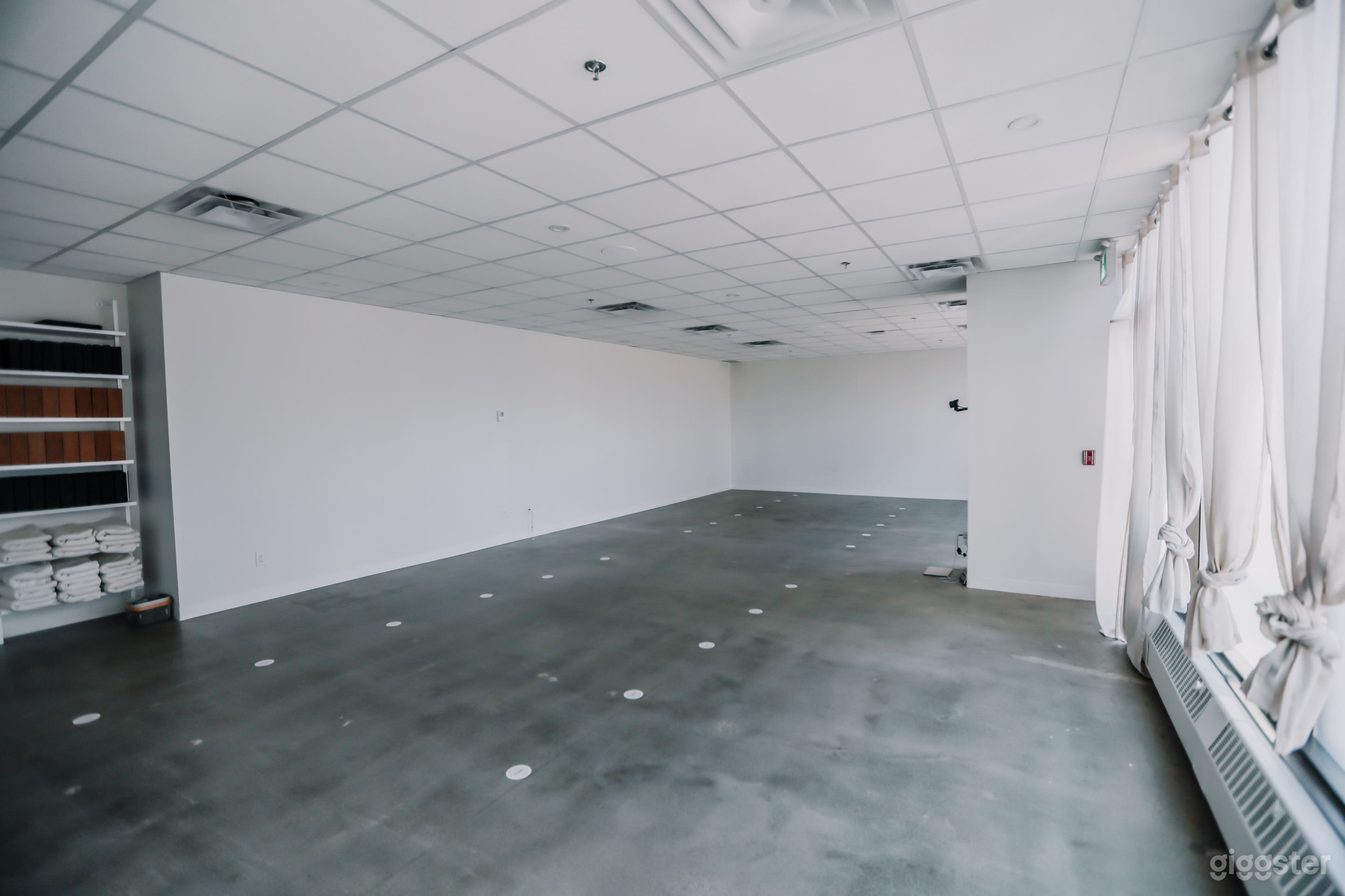 A blank canvas for photographers, videographers, and content creators seeking a bright and neutral backdrop.