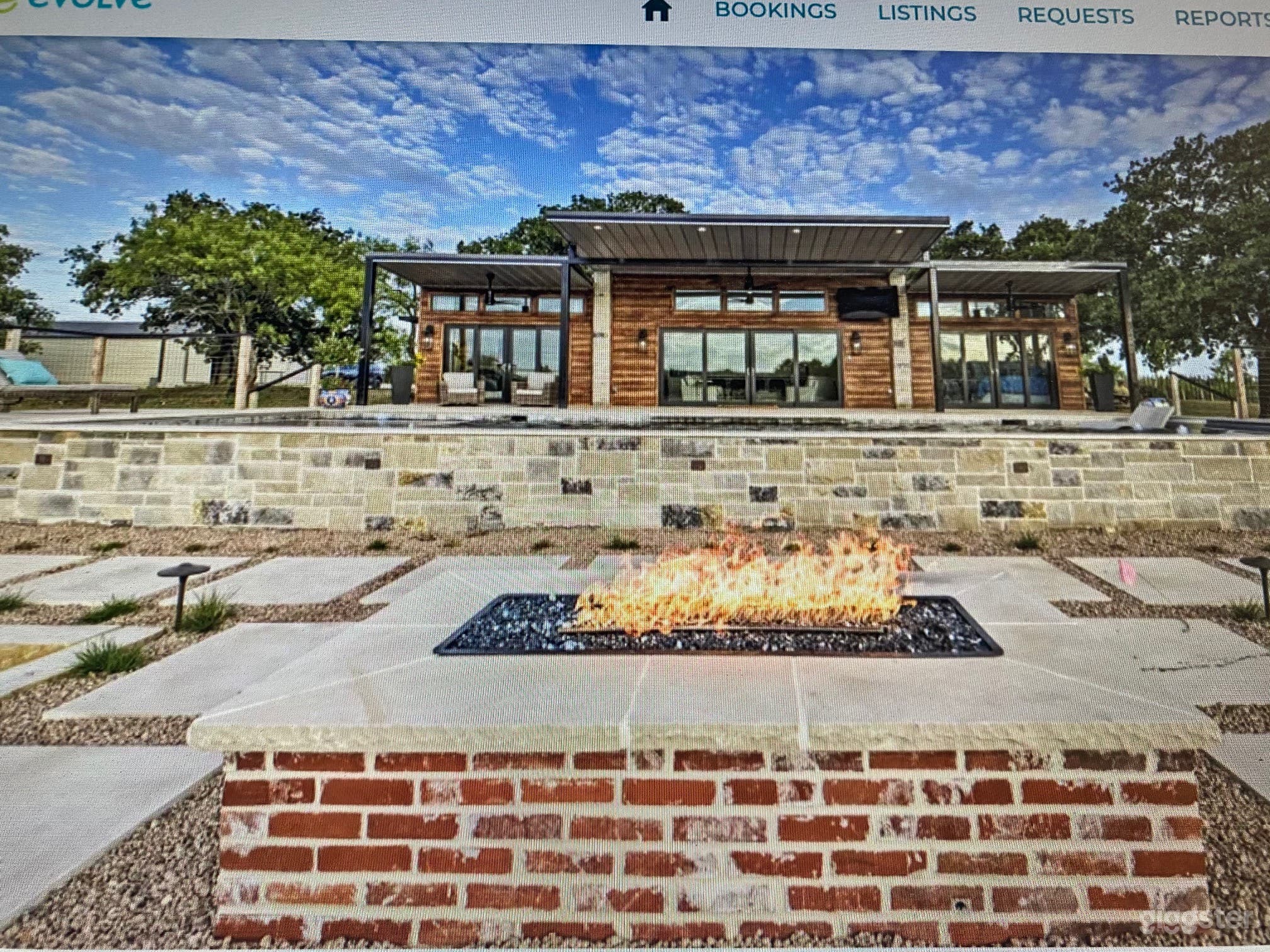 Front View of Home with Fire Pit 