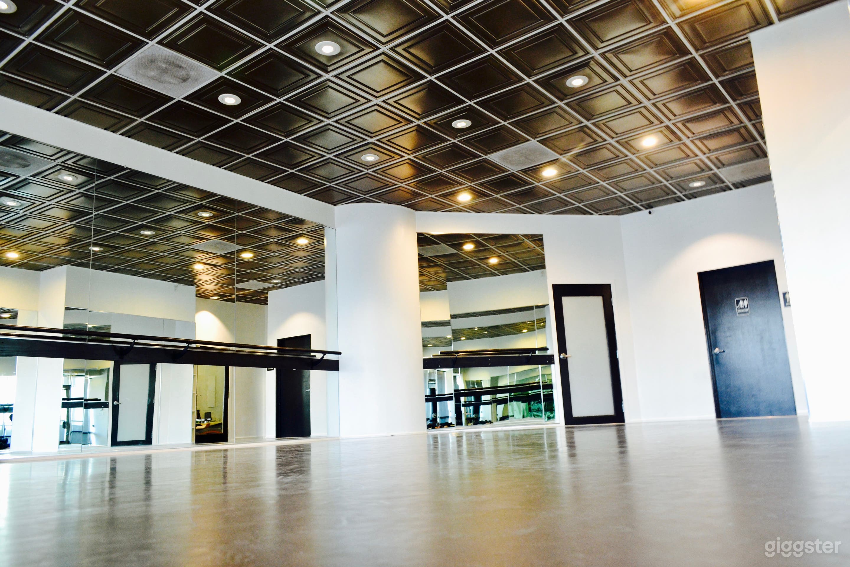 Dance studio ceiling tiles with adjustable pot lighting 