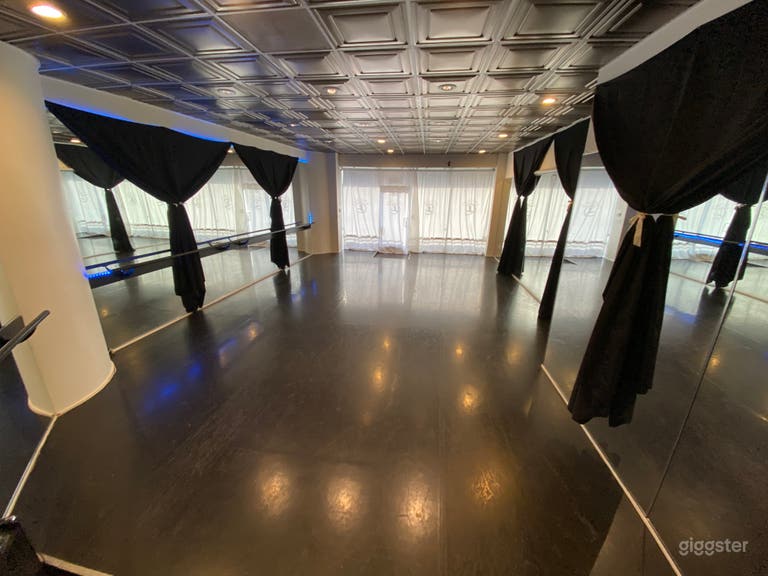  Dance studio with night vibes curtains to block out mirrors for performance or black box theater space  