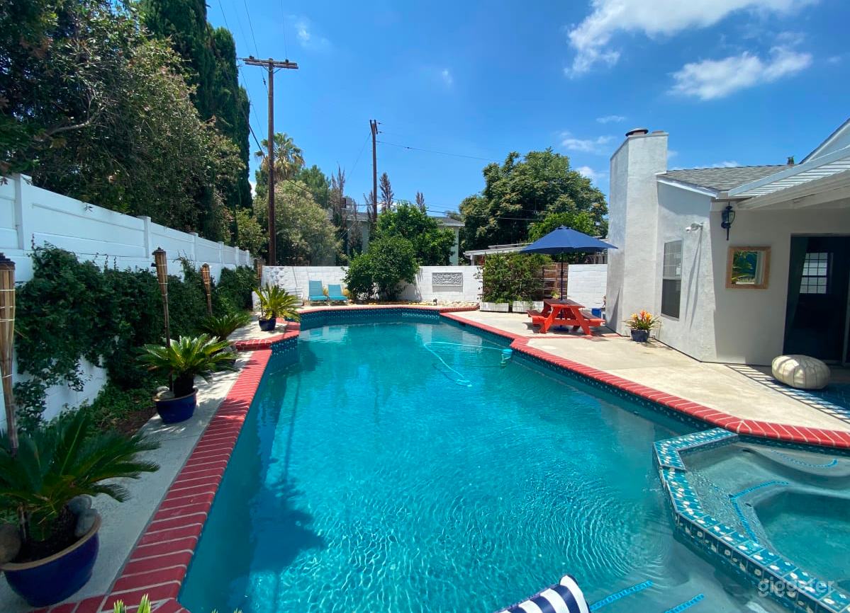 Mediterranean style pool and backyard Photo 4