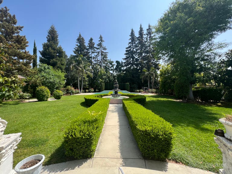  Extravagant Pool Garden with a Water Fountain  