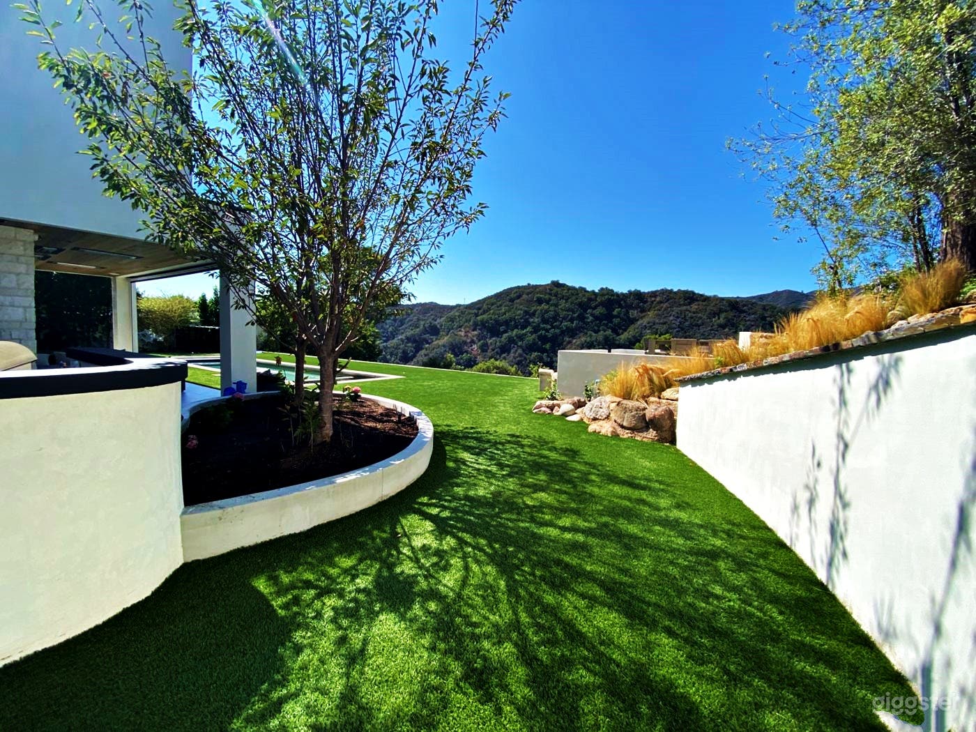 Poolside Oasis with Mountain Views Photo 4