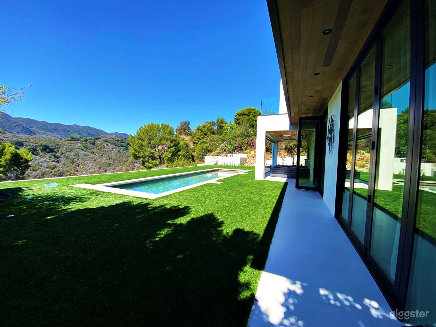 Poolside Oasis with Mountain Views Photo 3