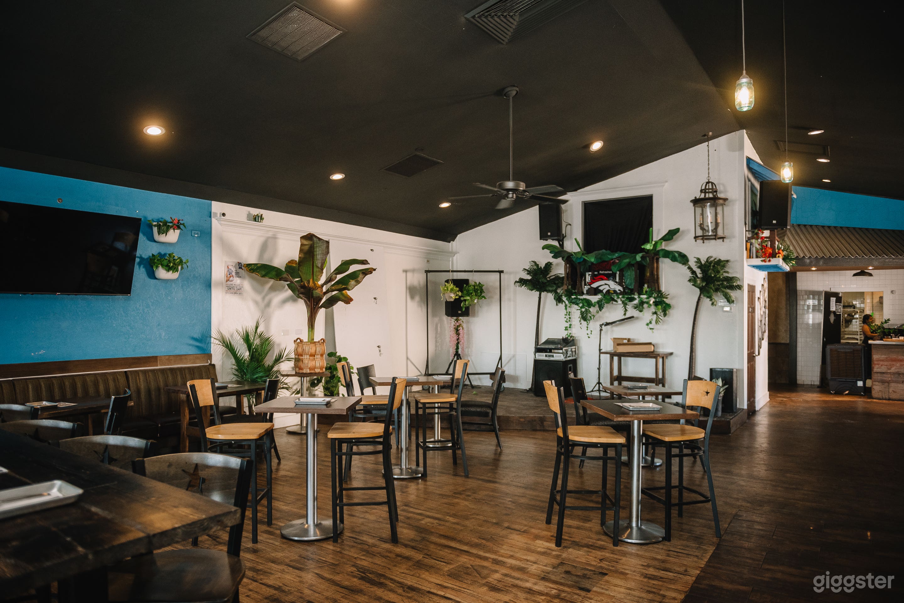 Beautiful restaurant space with table seating, full service bar, stage and sound equipment. 