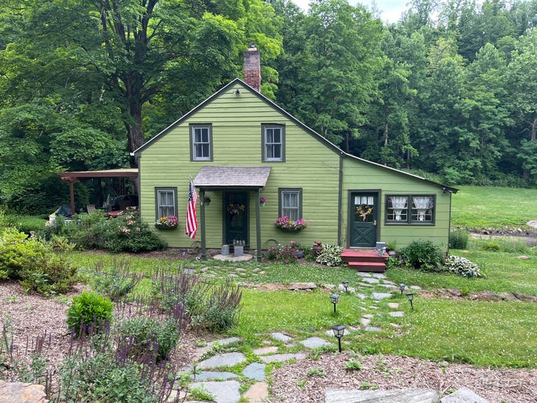  Front of house from road. Summer.  