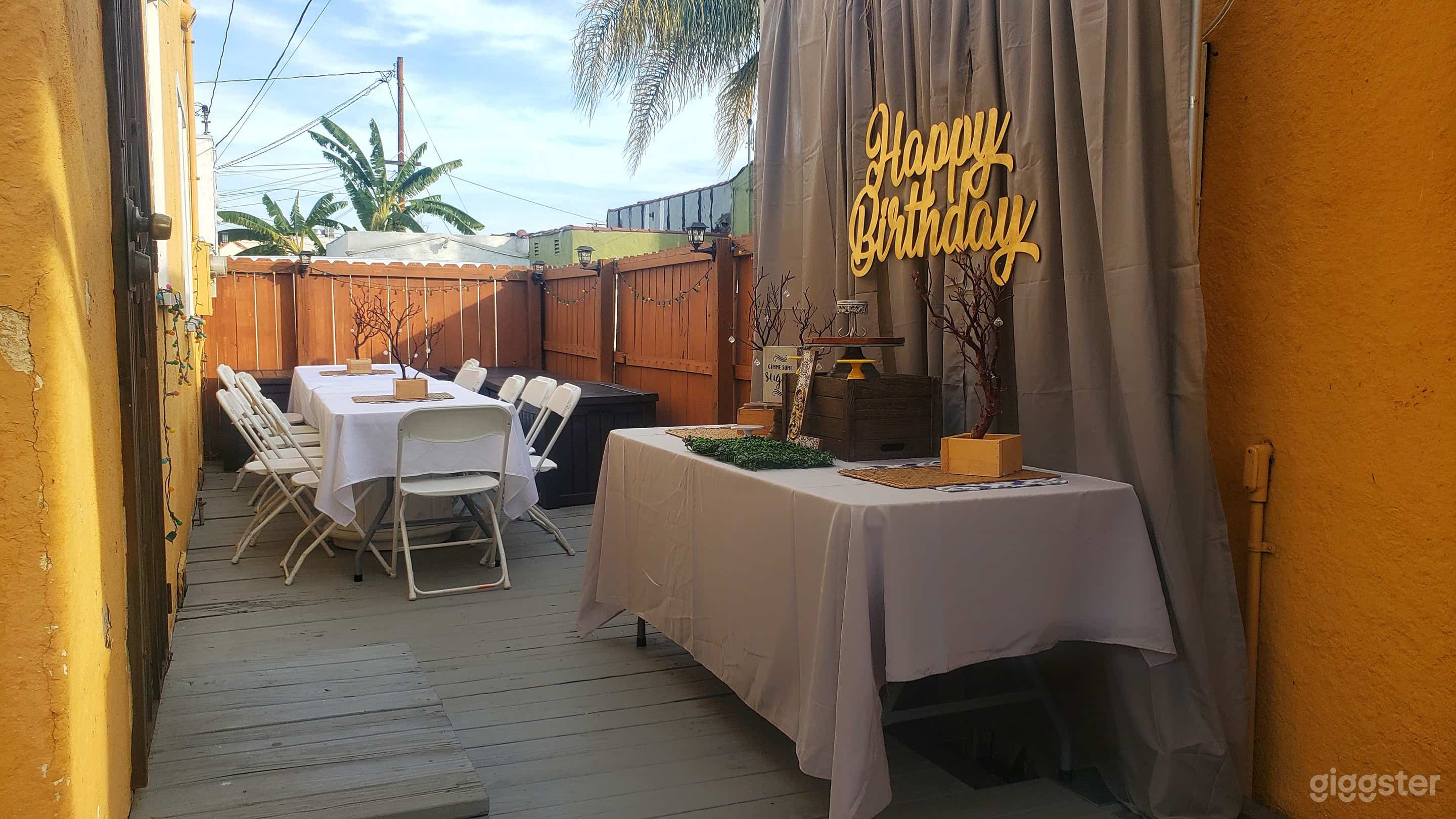 Decorated Outdoor Seating and dessert table area 