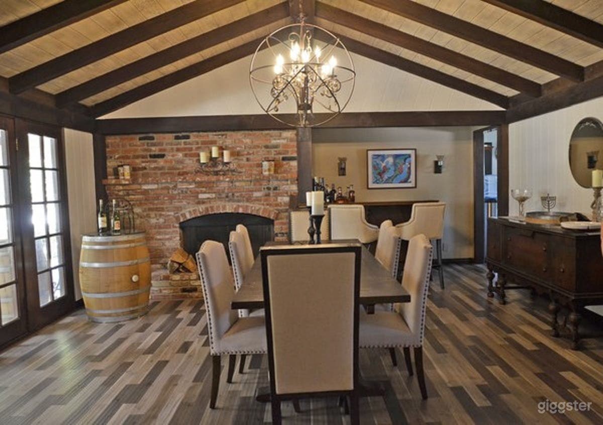 Dining Room with Brick Fireplace, Open Wood Beam Ceiling;  Bar, French Doors to patio