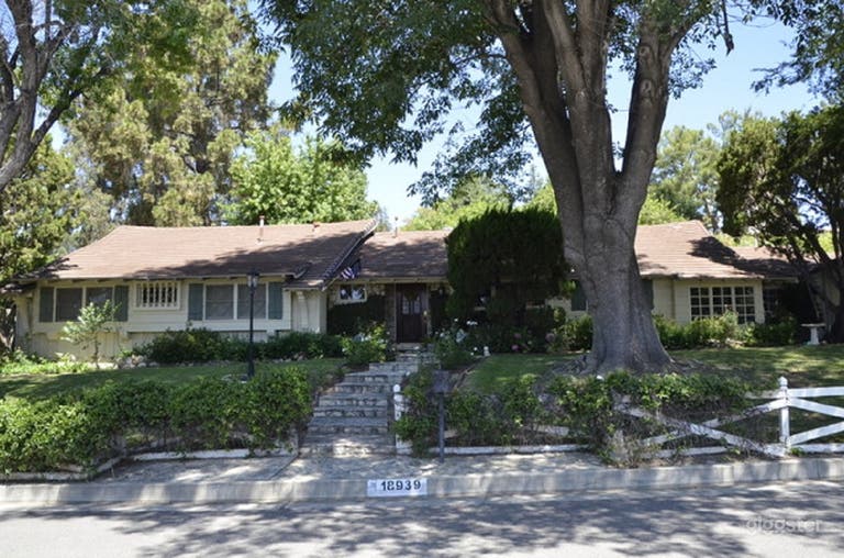  Front external view; flagstone staircase to front door; double lot with ample parking 