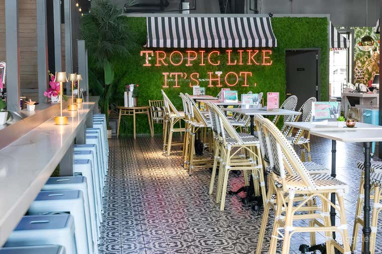  Retro Tropical Event Venue with Rooftop Deck & Games 