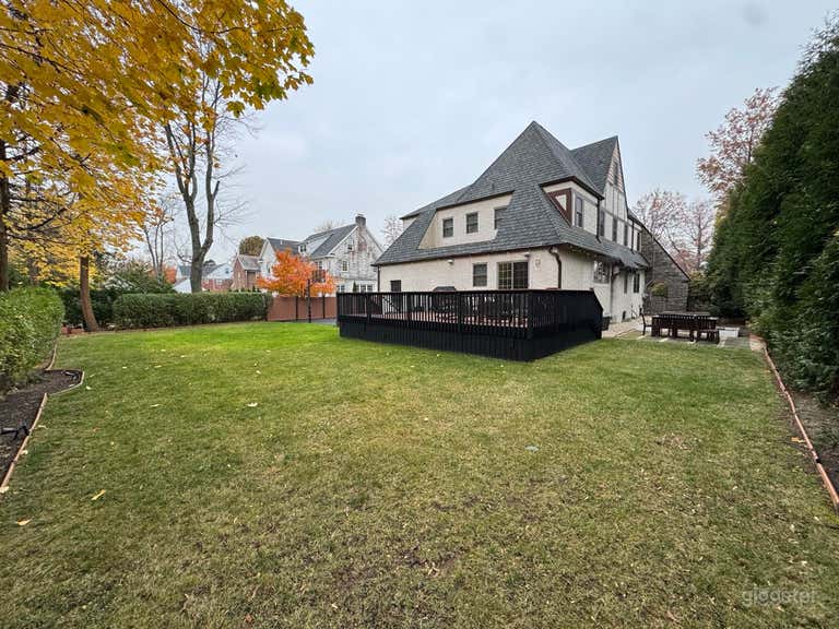  Backyard Haven Behind a Traditional Tudor Home 