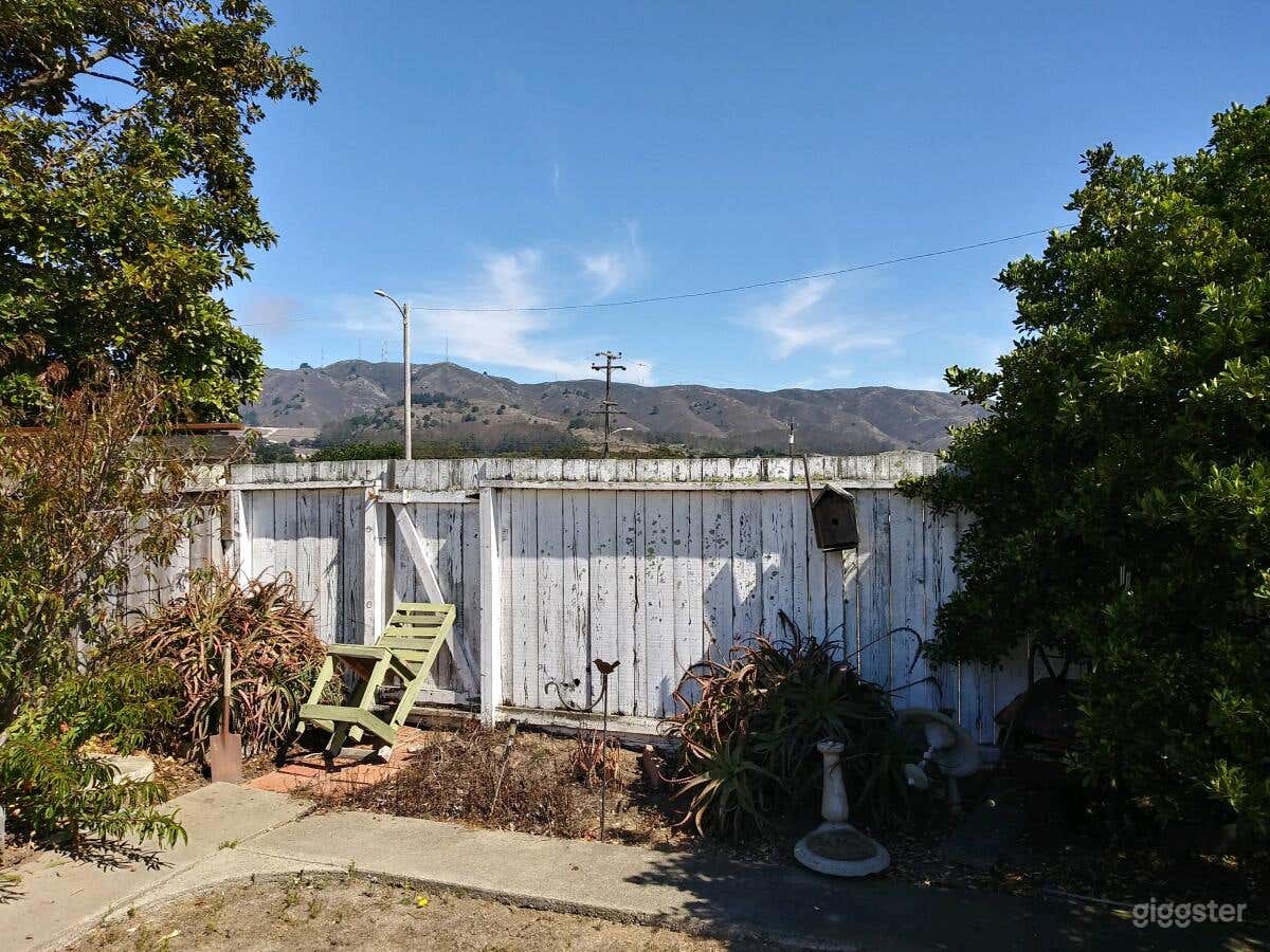 This is the back fence with the mountain view which on the other side is a flat easement, where there is a city park about 100 feet from the back fence