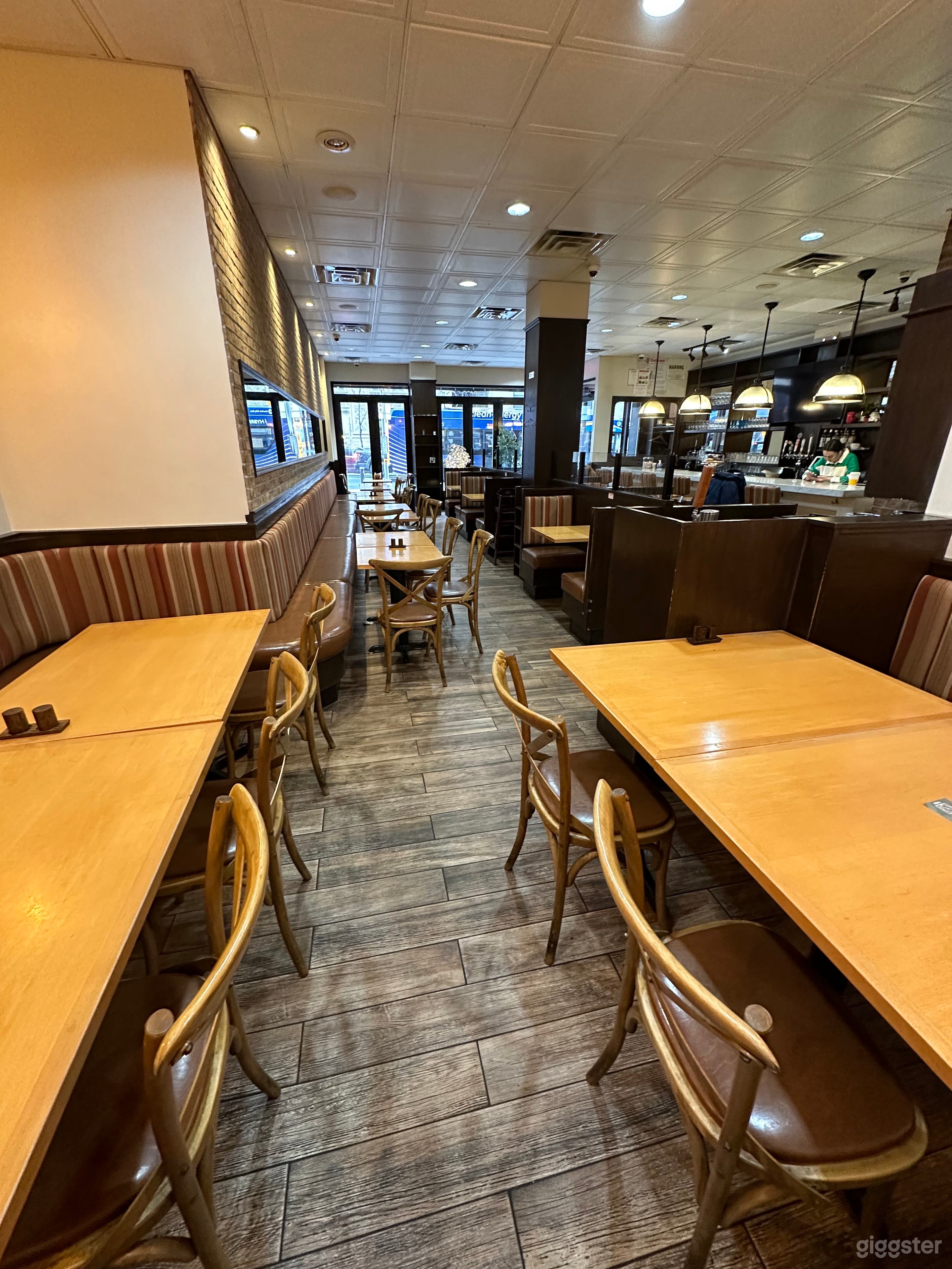 Seating in front of brick wall