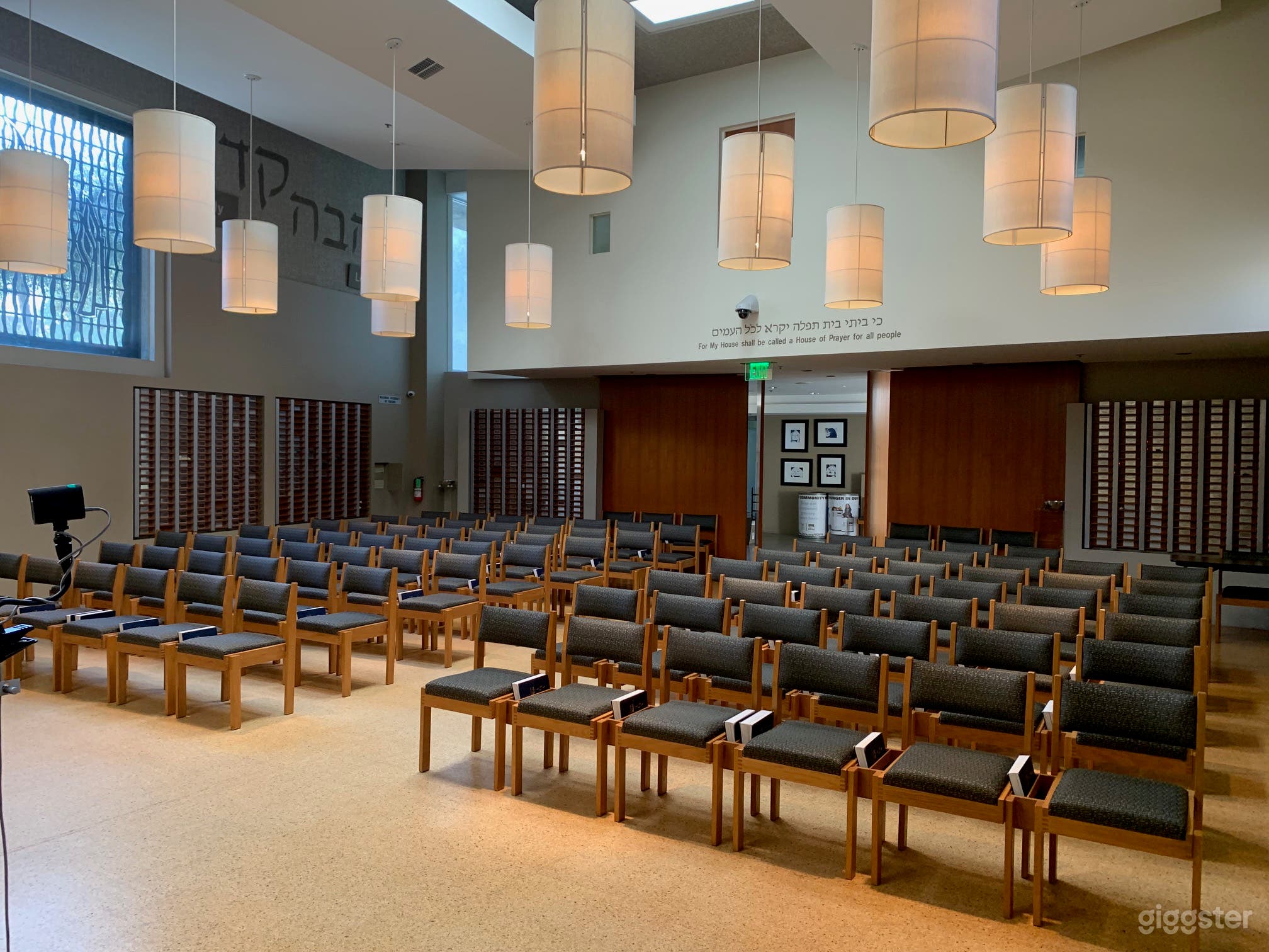 Sanctuary space set up in pew/pulpit style. Space can be contoured as well to reflect generic speaker/audience set-up. Vaulted ceilings, natural light, seating for +/- 100.
