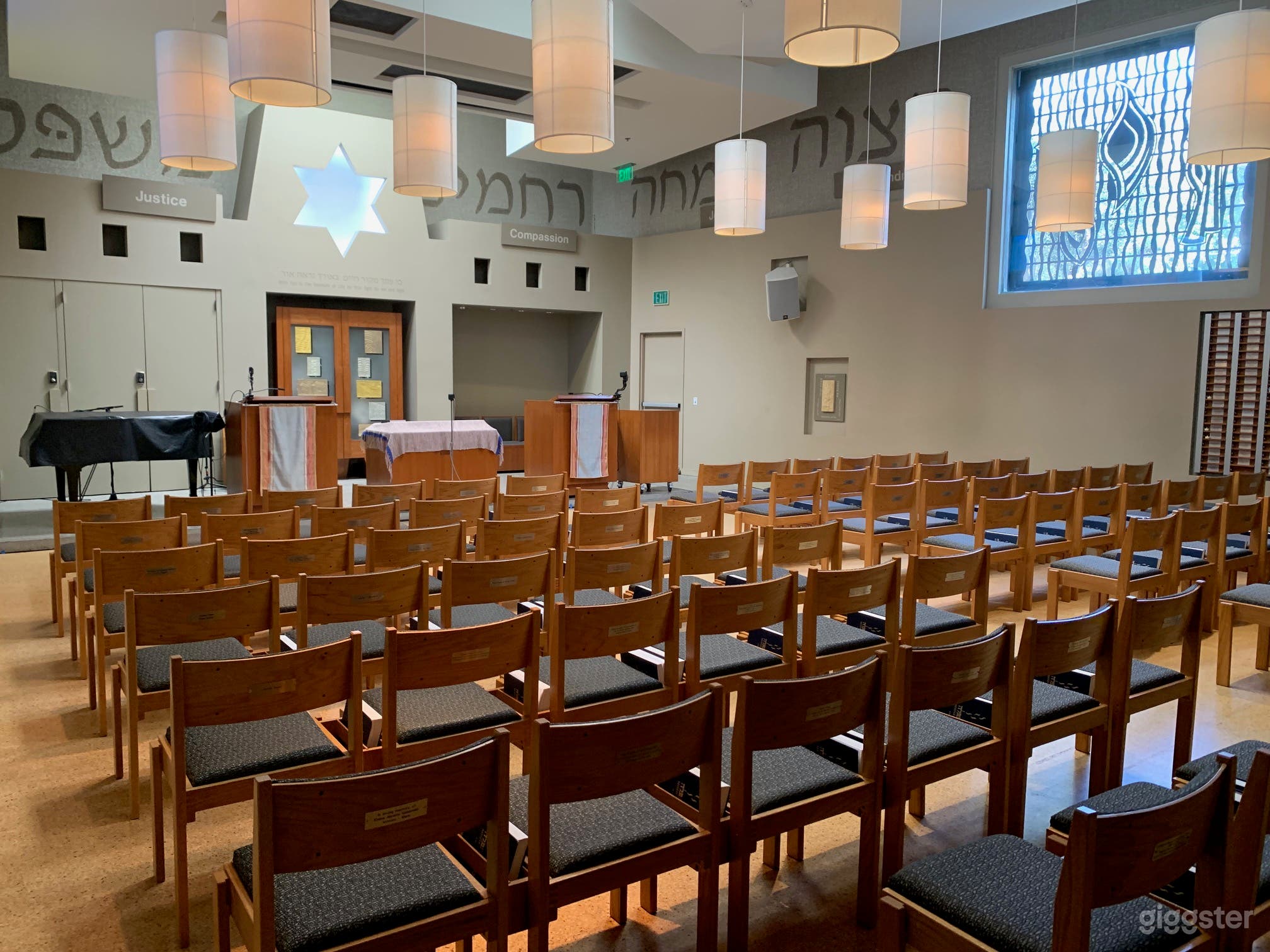Sanctuary space set up in pew/pulpit style. Space can be contoured as well to reflect generic speaker/audience set-up. Vaulted ceilings, natural light, seating for +/- 100. 