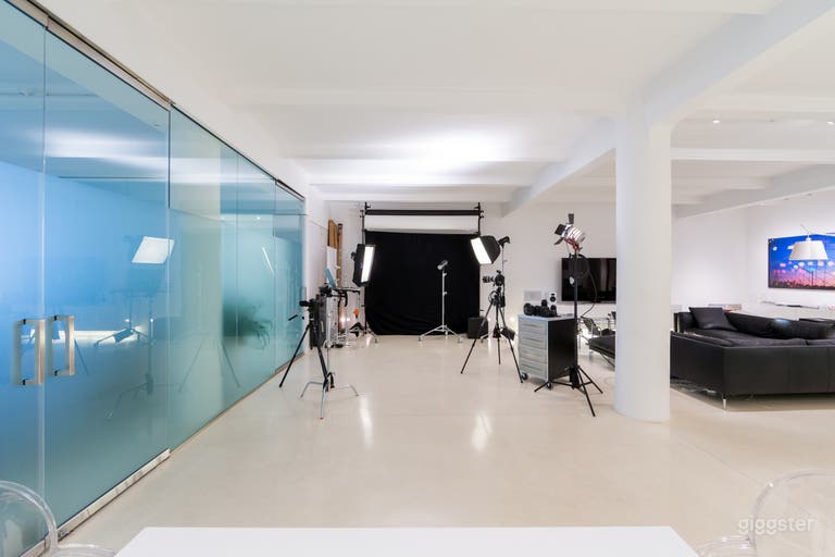  Photo Studio space with private glassed in conference room on the left. 