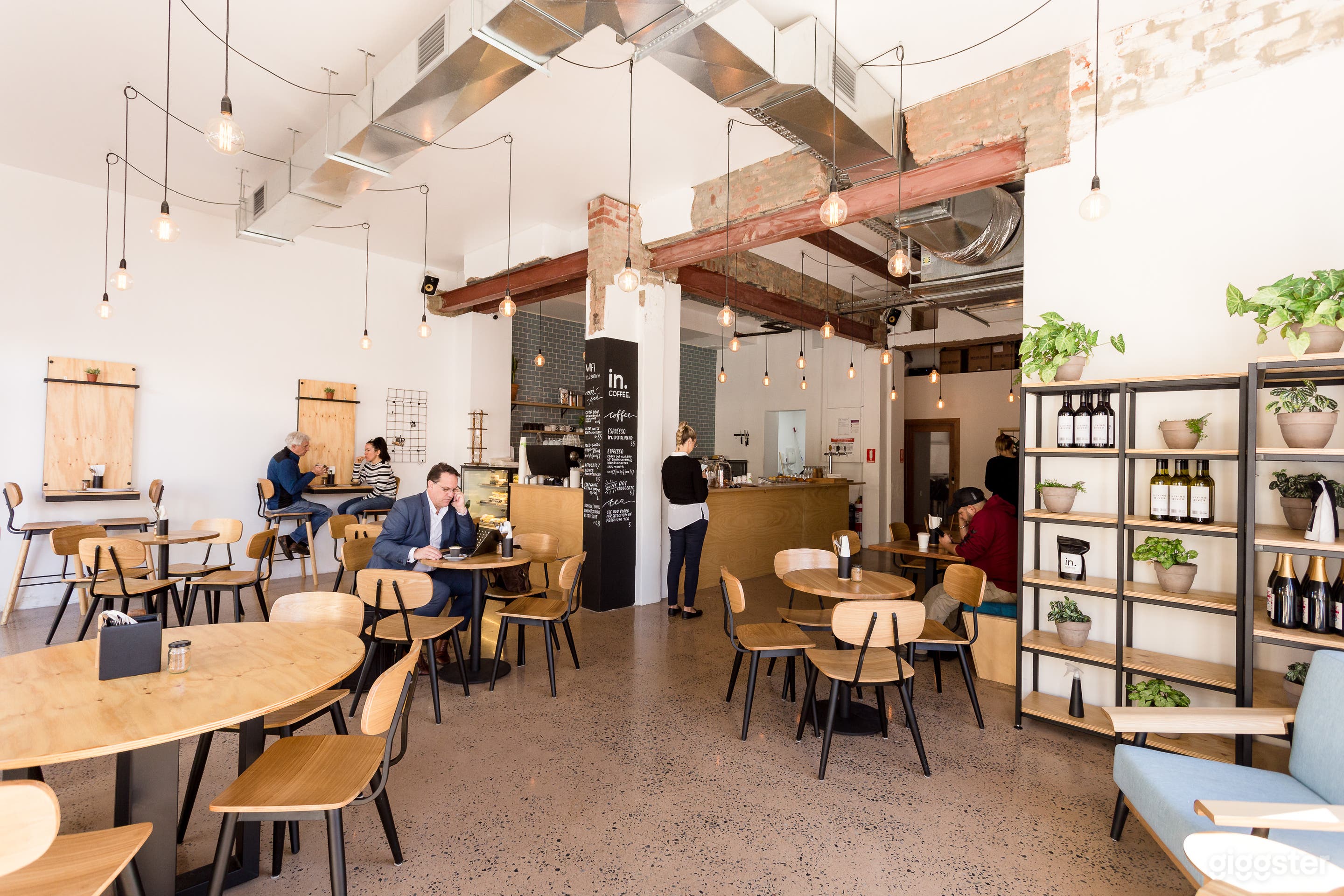 Charming Cafe with Industrial Studio Space Photo 1