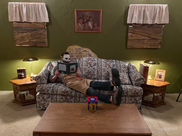  Serial killers home has living room, bedroom, dark hallway, kitchen and porch area 