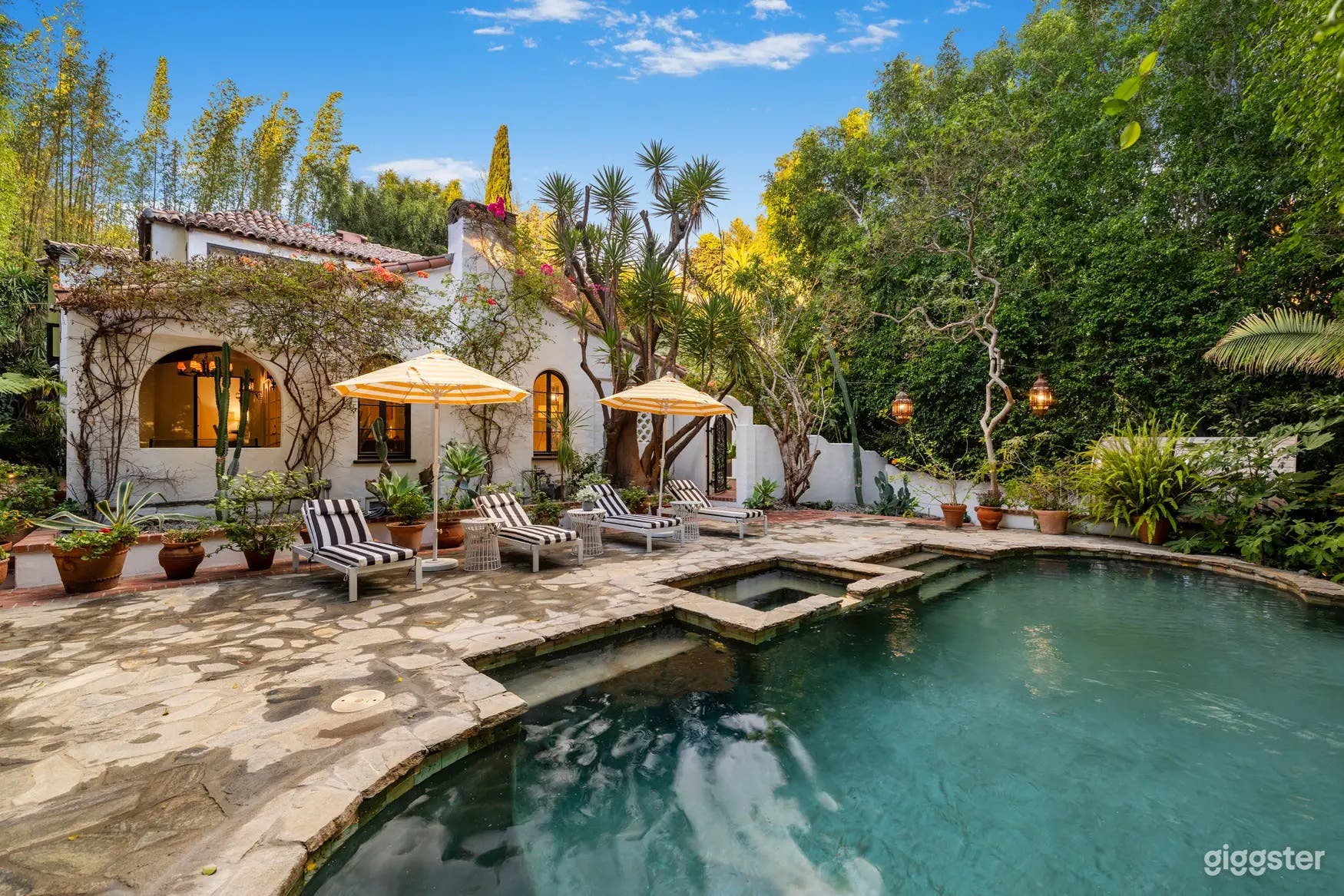 SECLUDED SPANISH LAGOON-STYLE POOL Photo 1