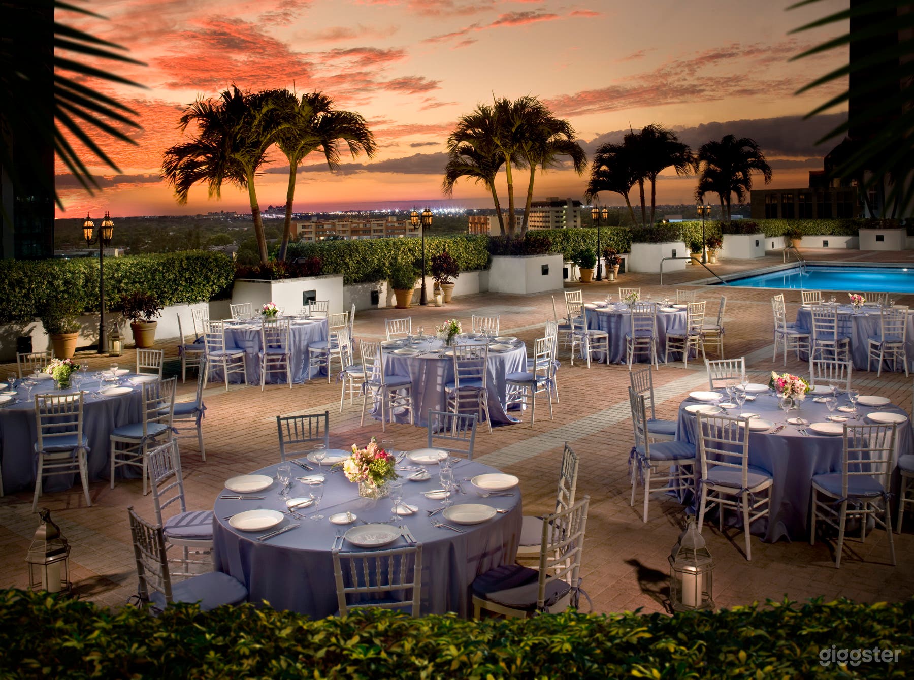 Elegant Poolside Event Terrace with Outdoor Dining Photo 1