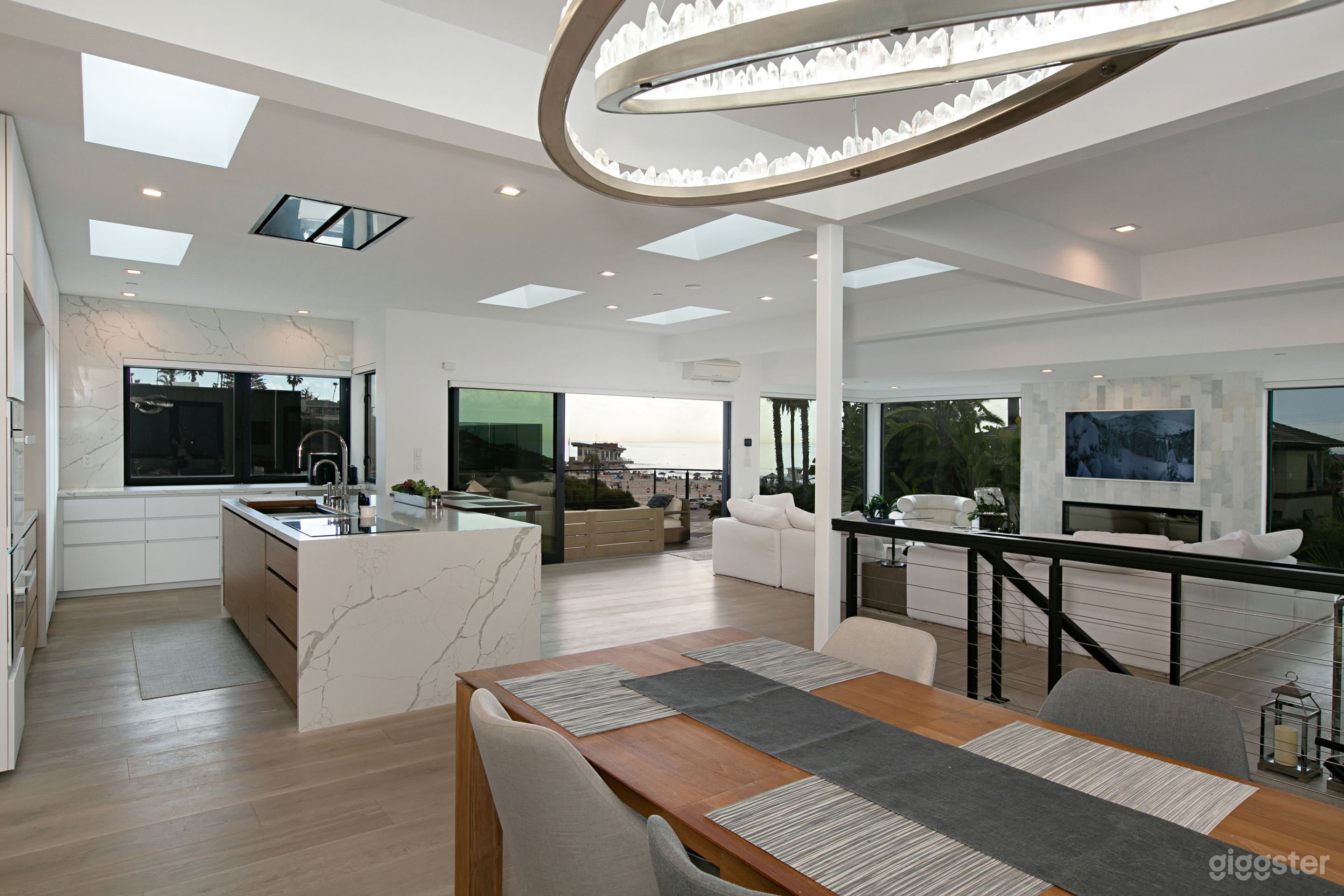 Large great room with lots of light and beach and ocean views