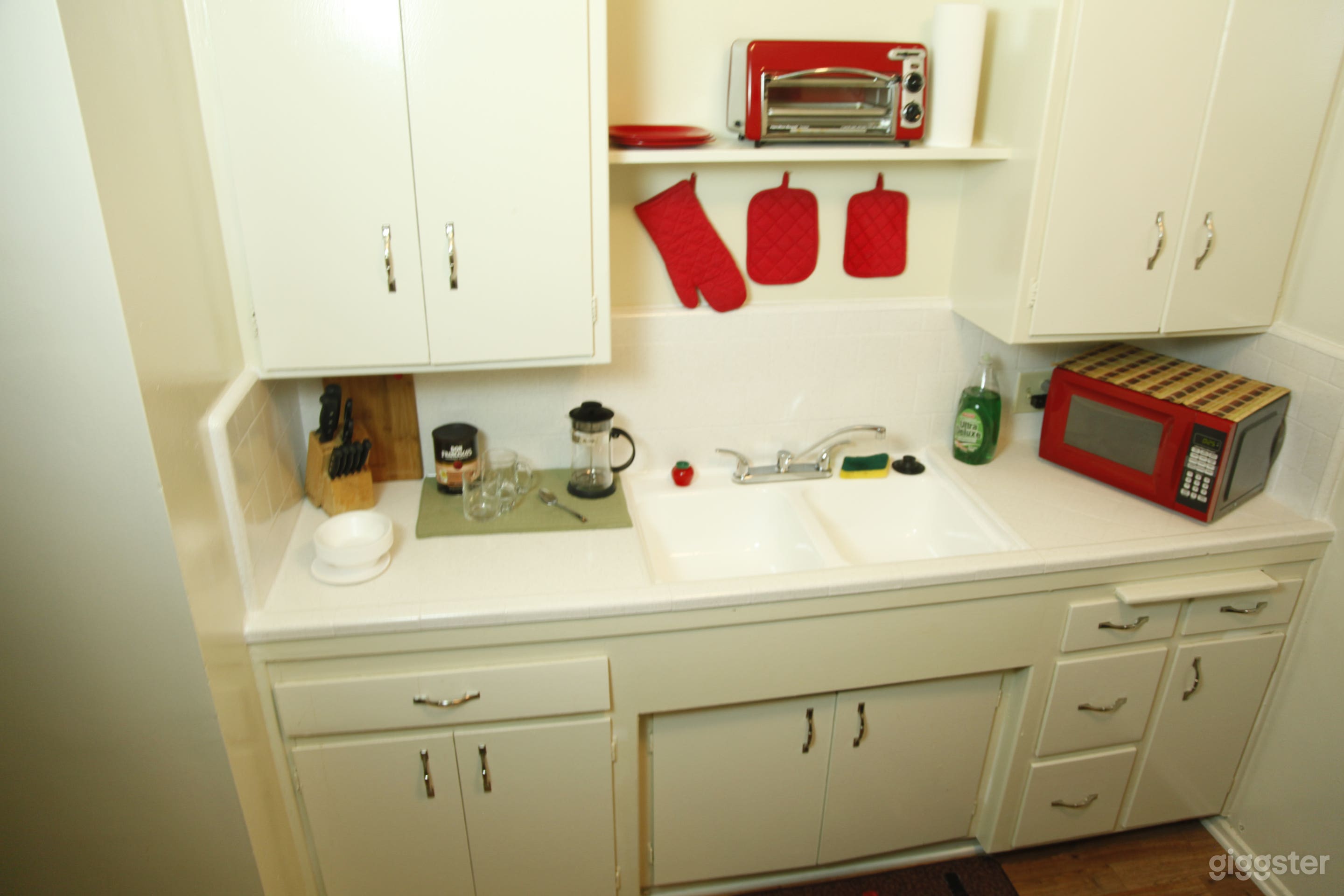 Country country with with white gas stove and fridge in great condition.  