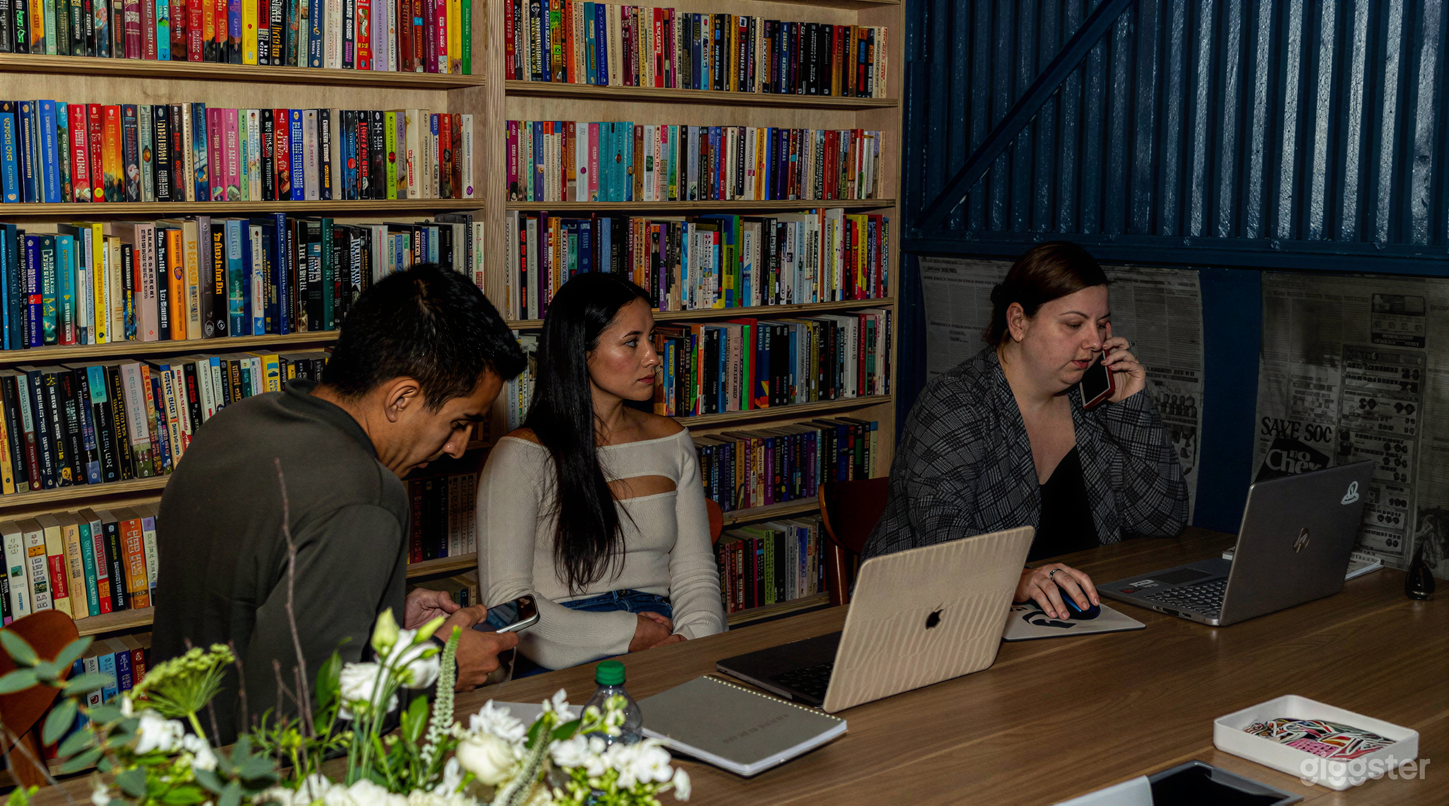 Library-Inspired Conference Room with Wall-to-Wall Books Photo 3