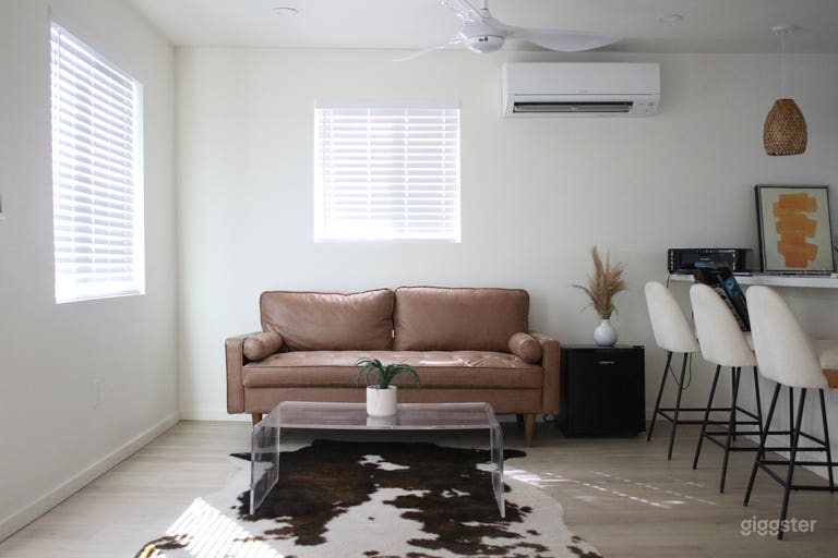  Couch in living room space with breakfast bar 