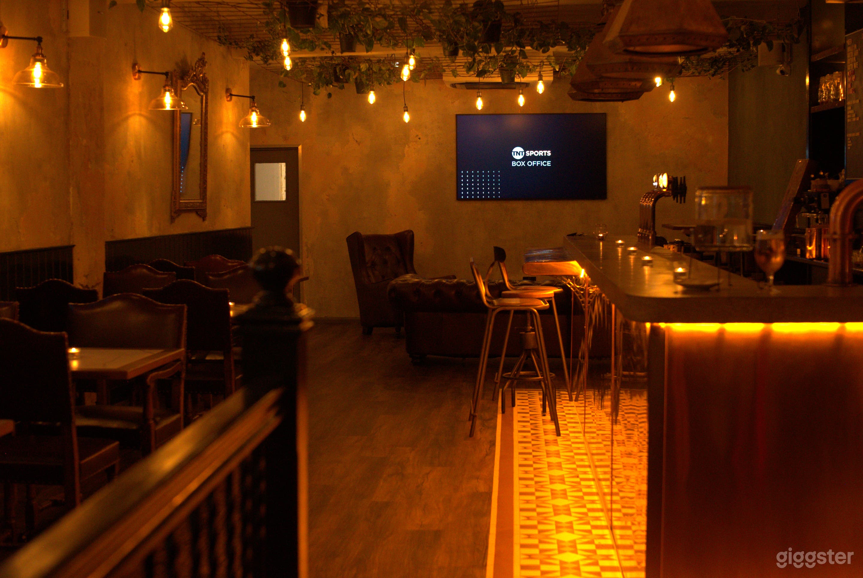 Second Floor Cozy Bar with Cement Looking Walls Photo 2