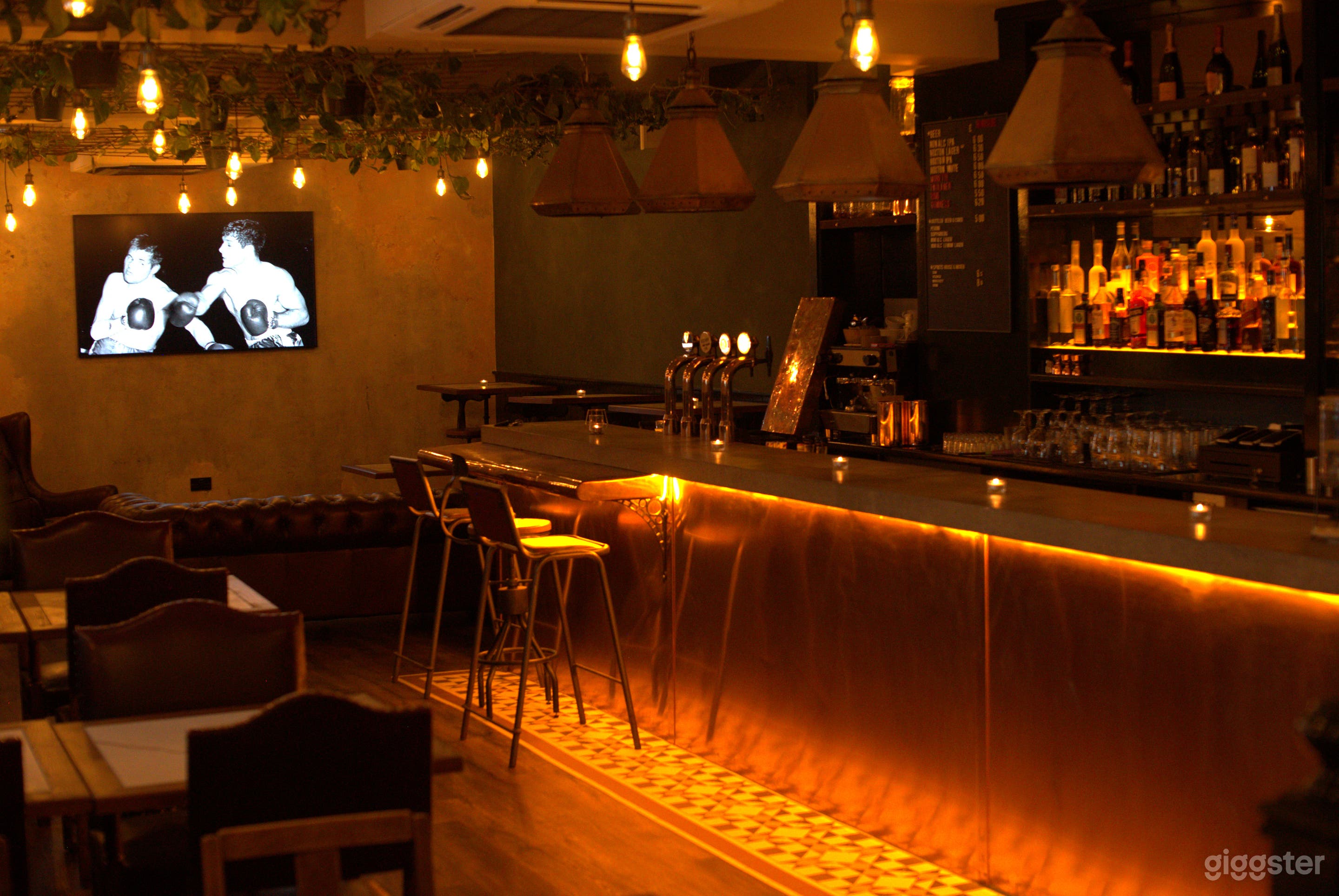 Second Floor Cozy Bar with Cement Looking Walls Photo 4