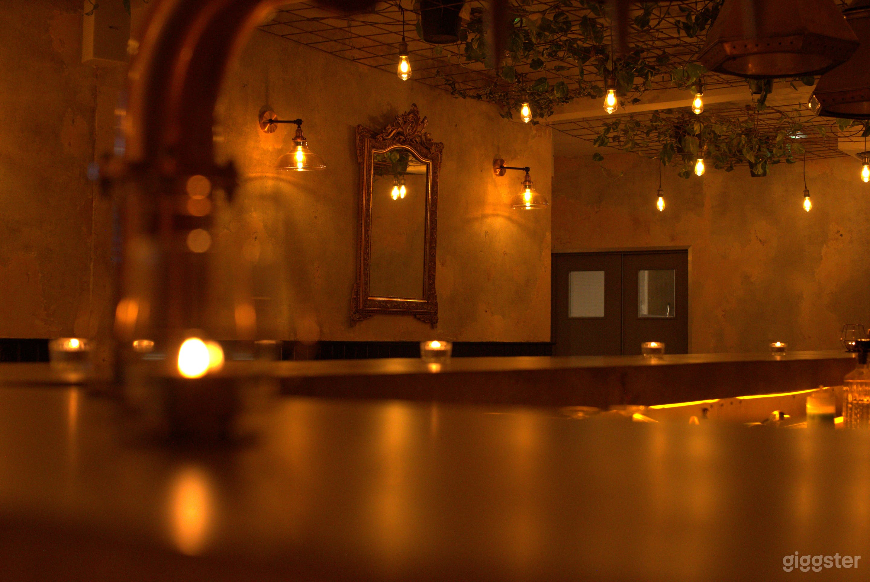 Second Floor Cozy Bar with Cement Looking Walls Photo 1