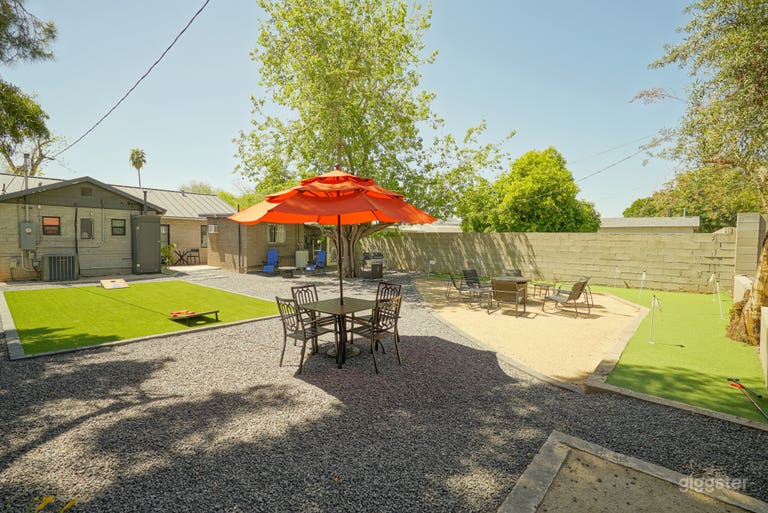  View from the corner of the backyard with a concrete wall bordering the backyard. Backs up to a canal. 