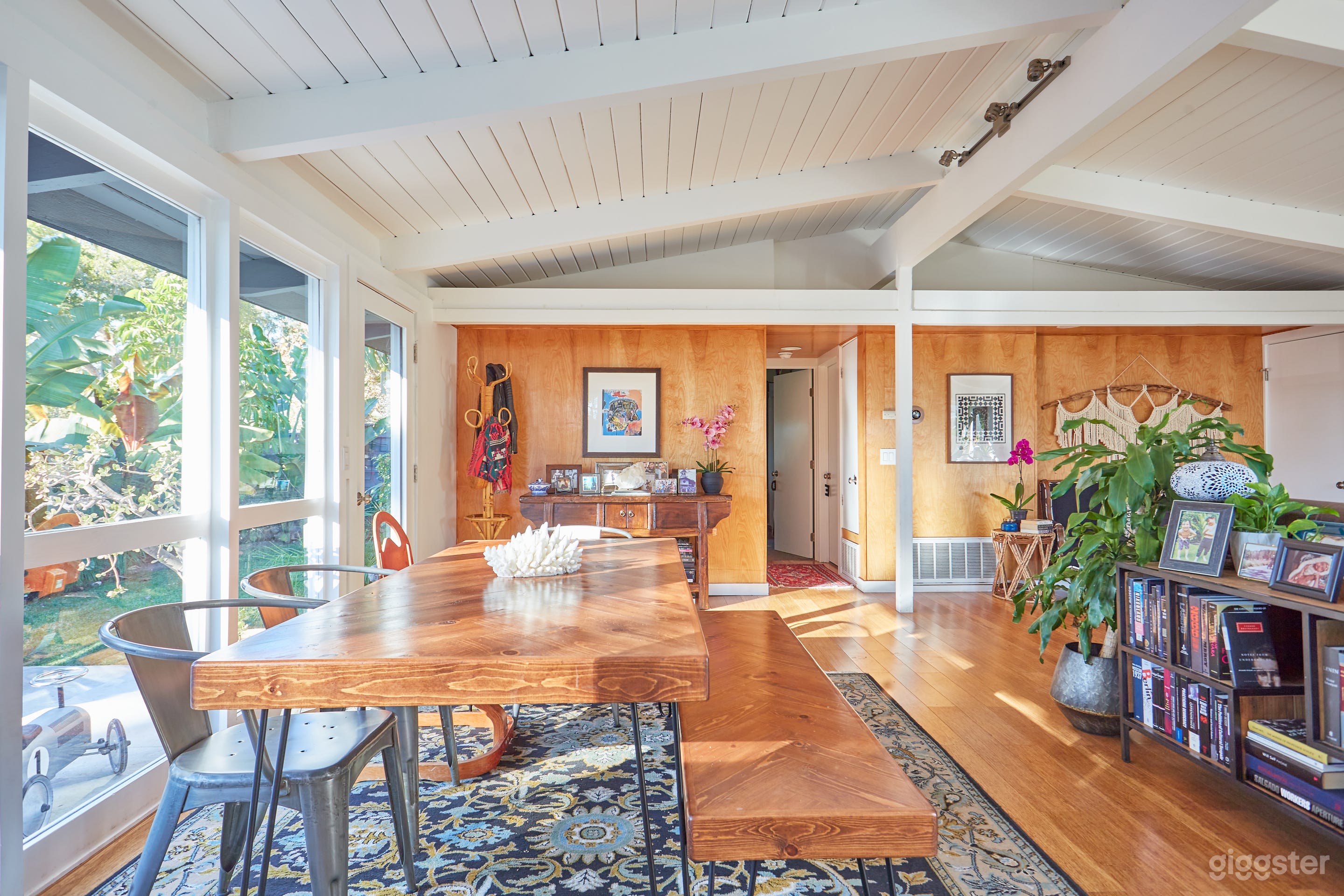 Original post and beam architecture with maple wood paneling