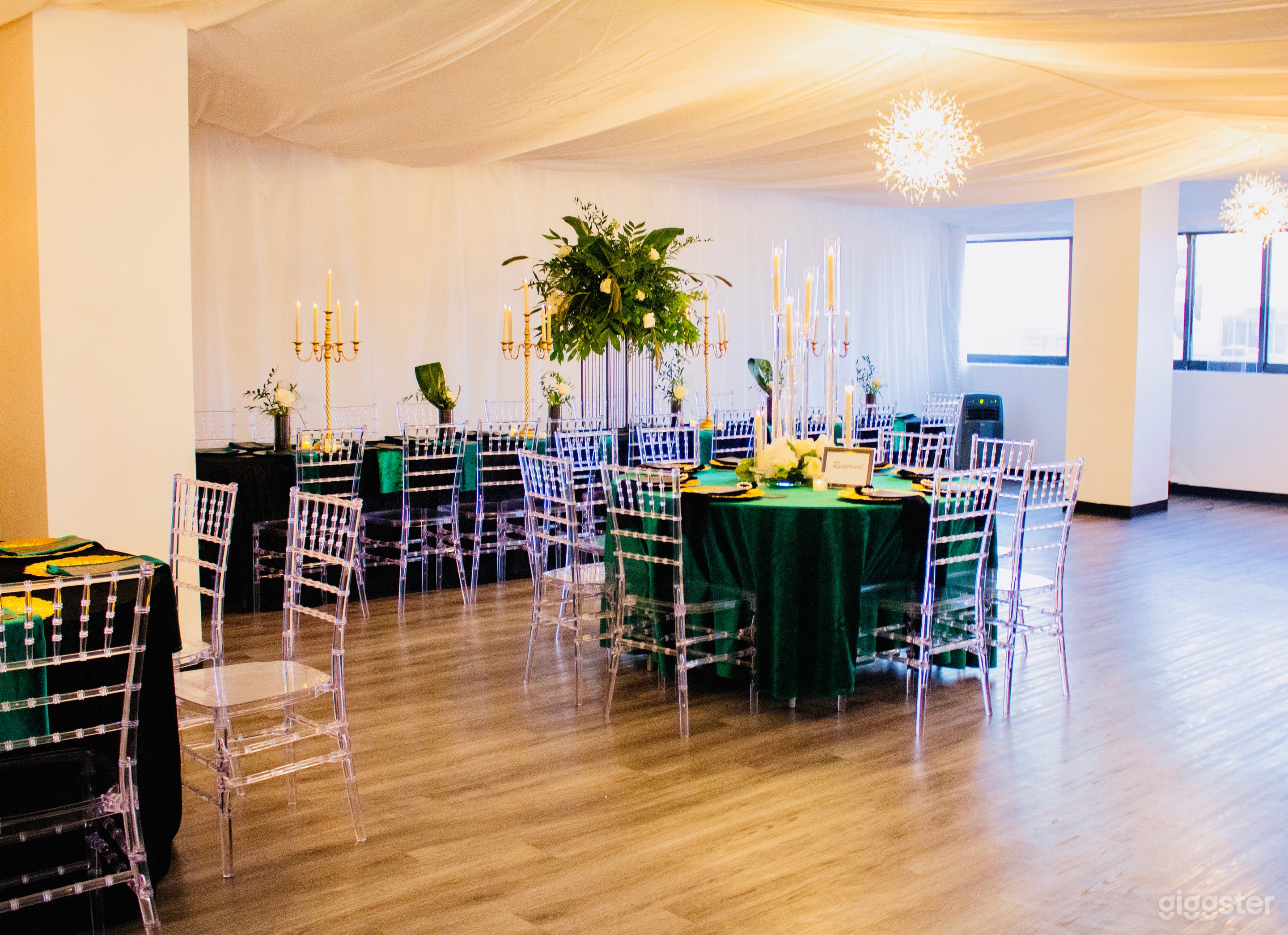 Intimate All-White Event Space with Draping & Chandeliers Photo 2