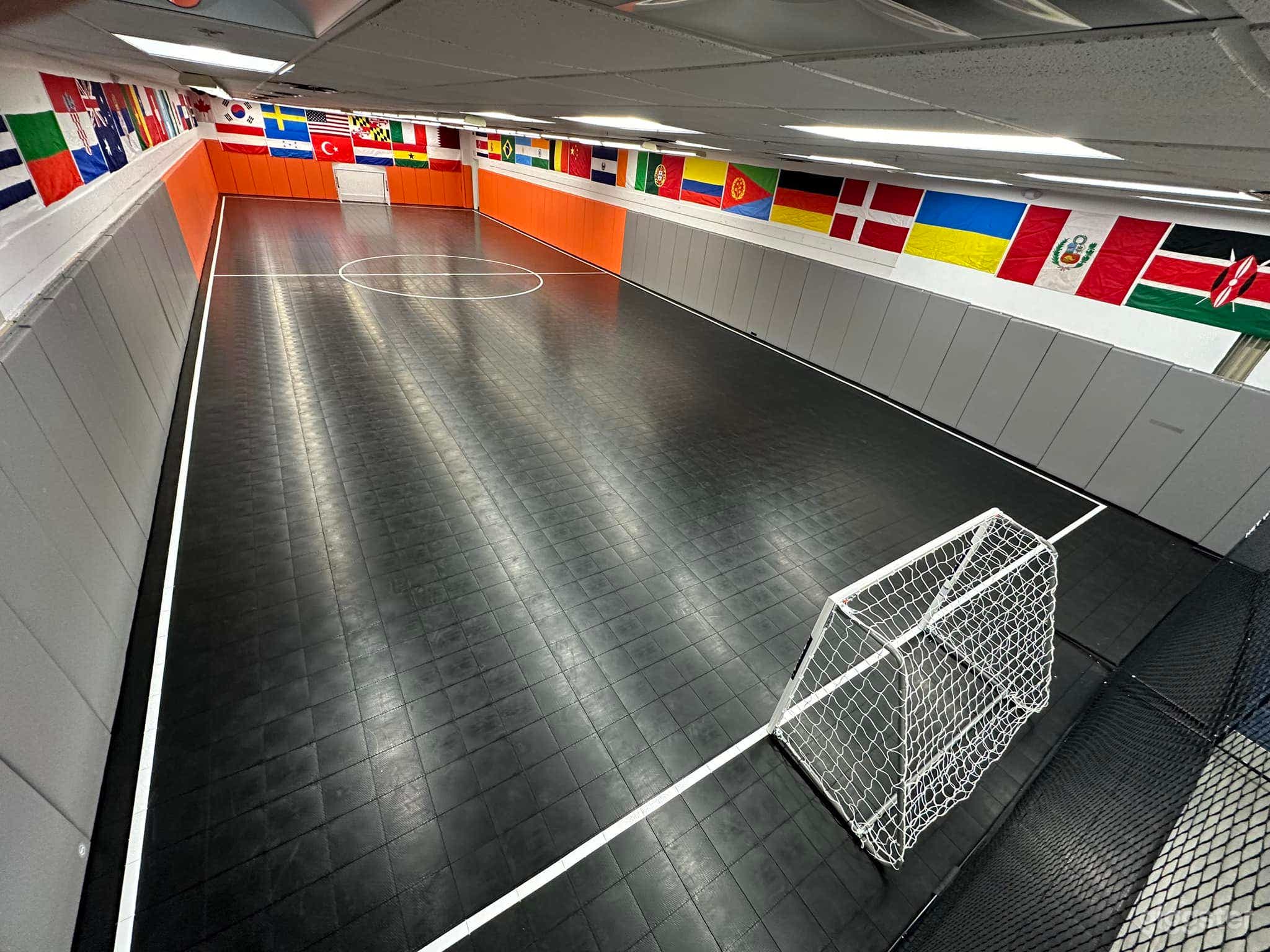 Court dimensions are roughly 11 by 33 yards, slightly smaller than a basketball court.