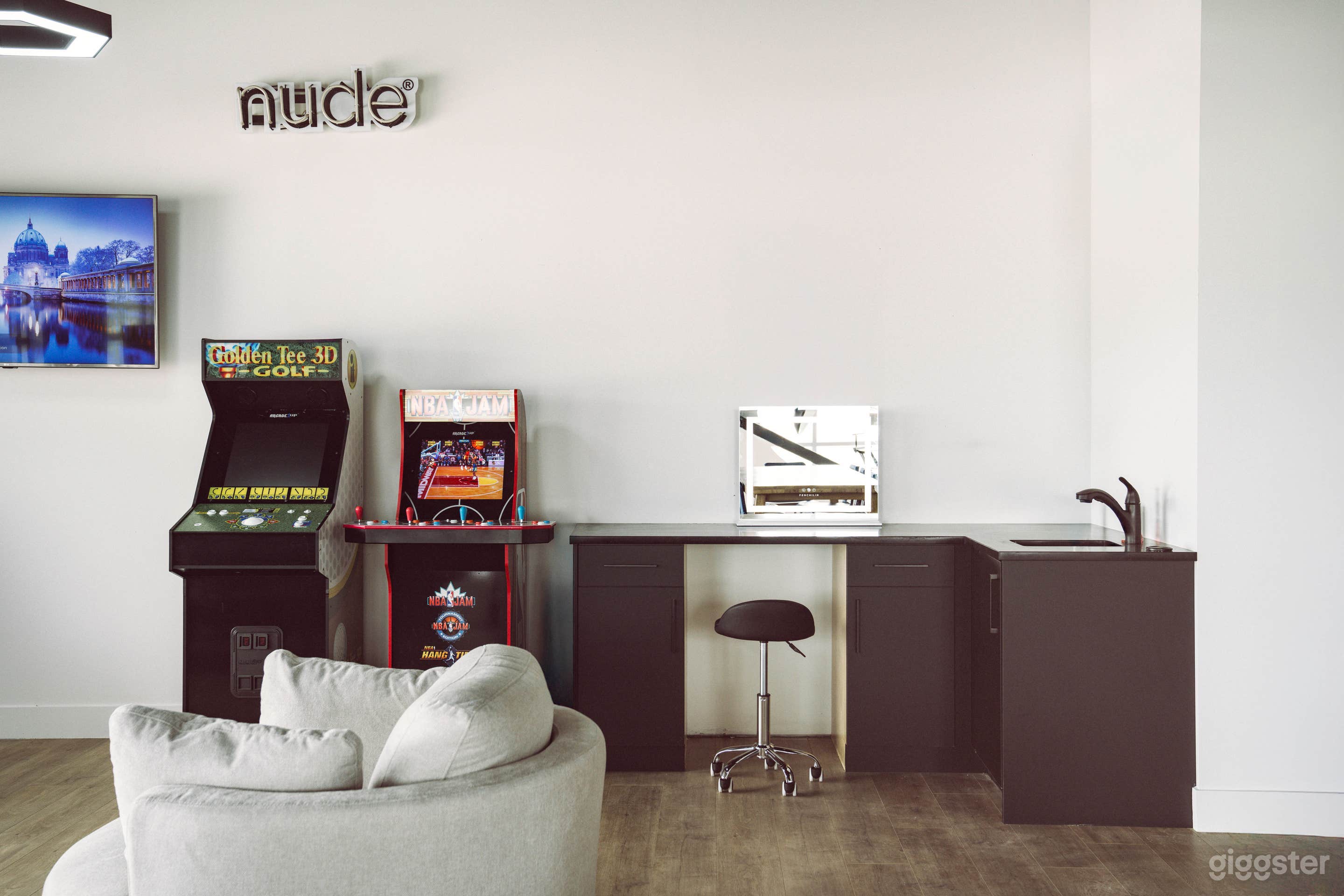 Our rec and prep space includes a lit vanity space for hair and makeup, a fridge, and a sink.