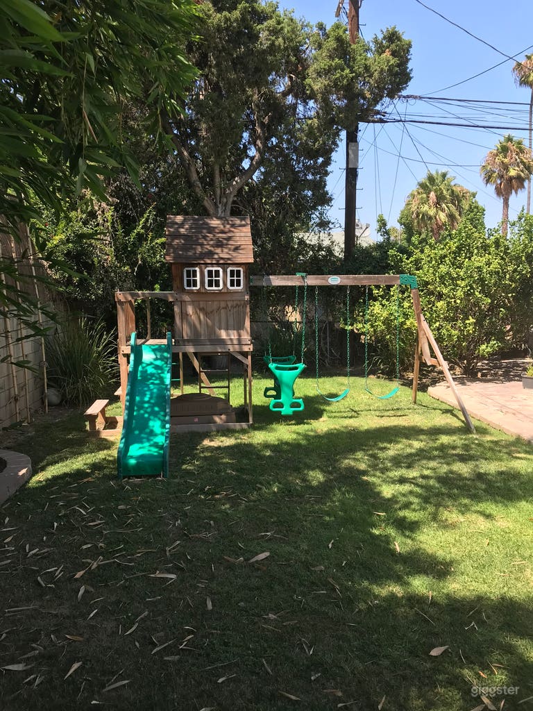  Kids love to have fun in the sun at our backyard playground. 