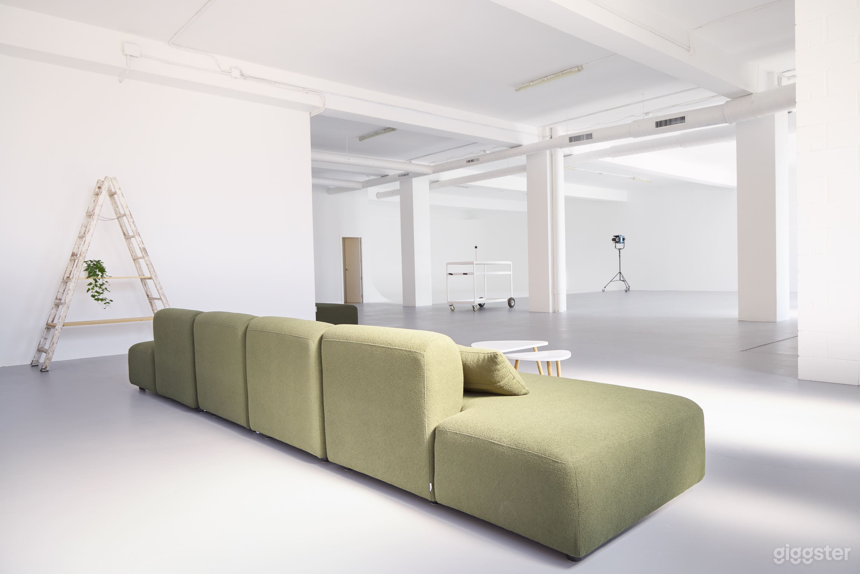 View from the southwest corner of the studio, showcasing the depth of the space.