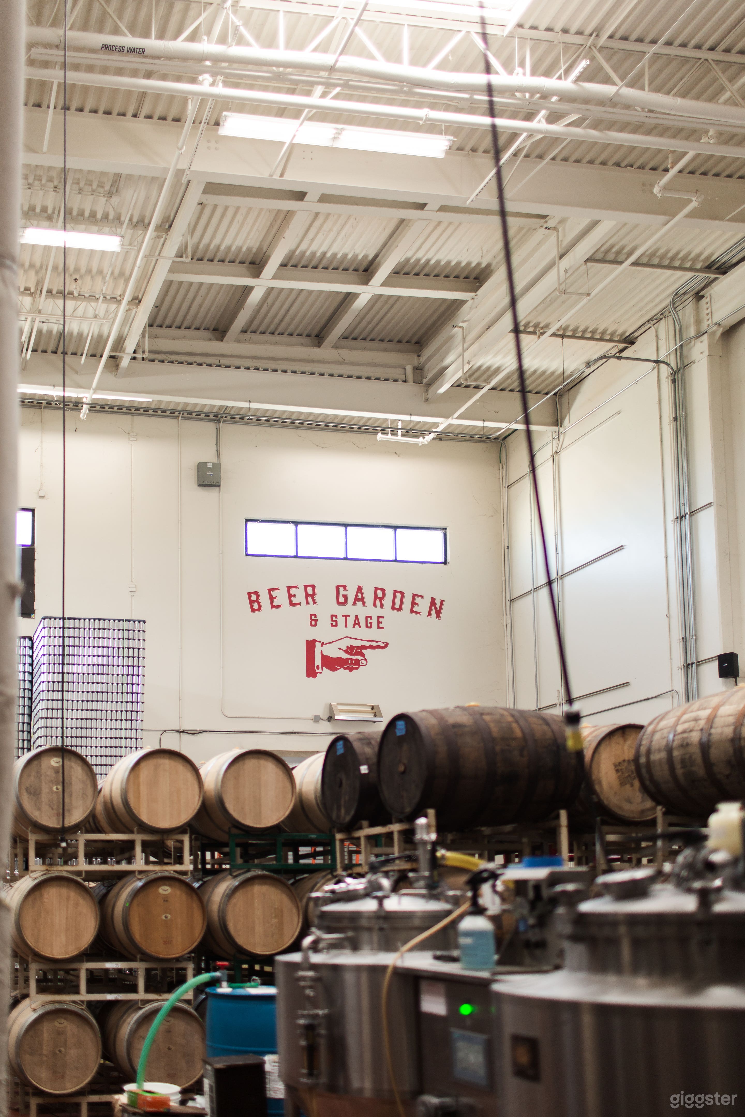 barrels and cans in production area
