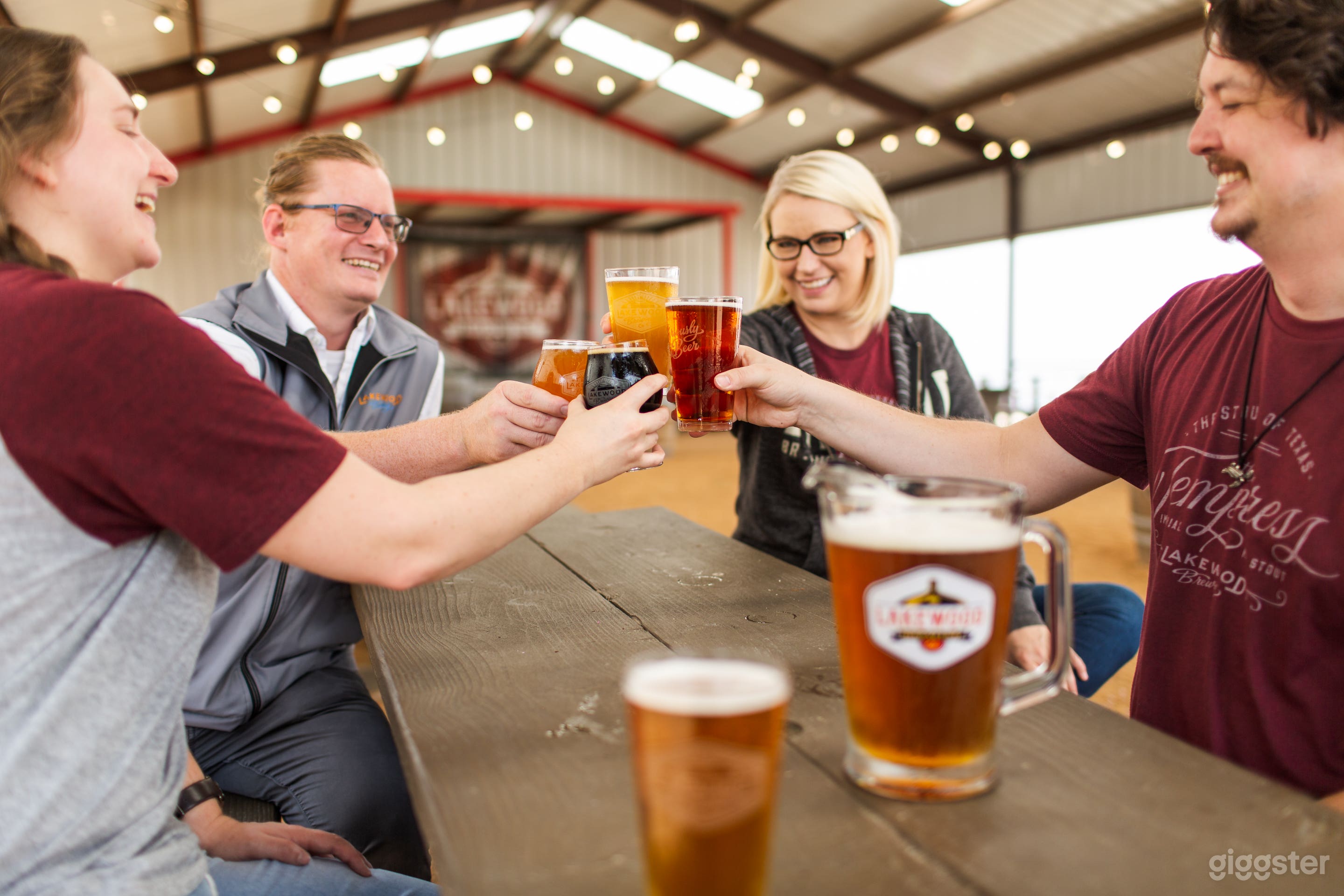 inside beer garden, stage in background