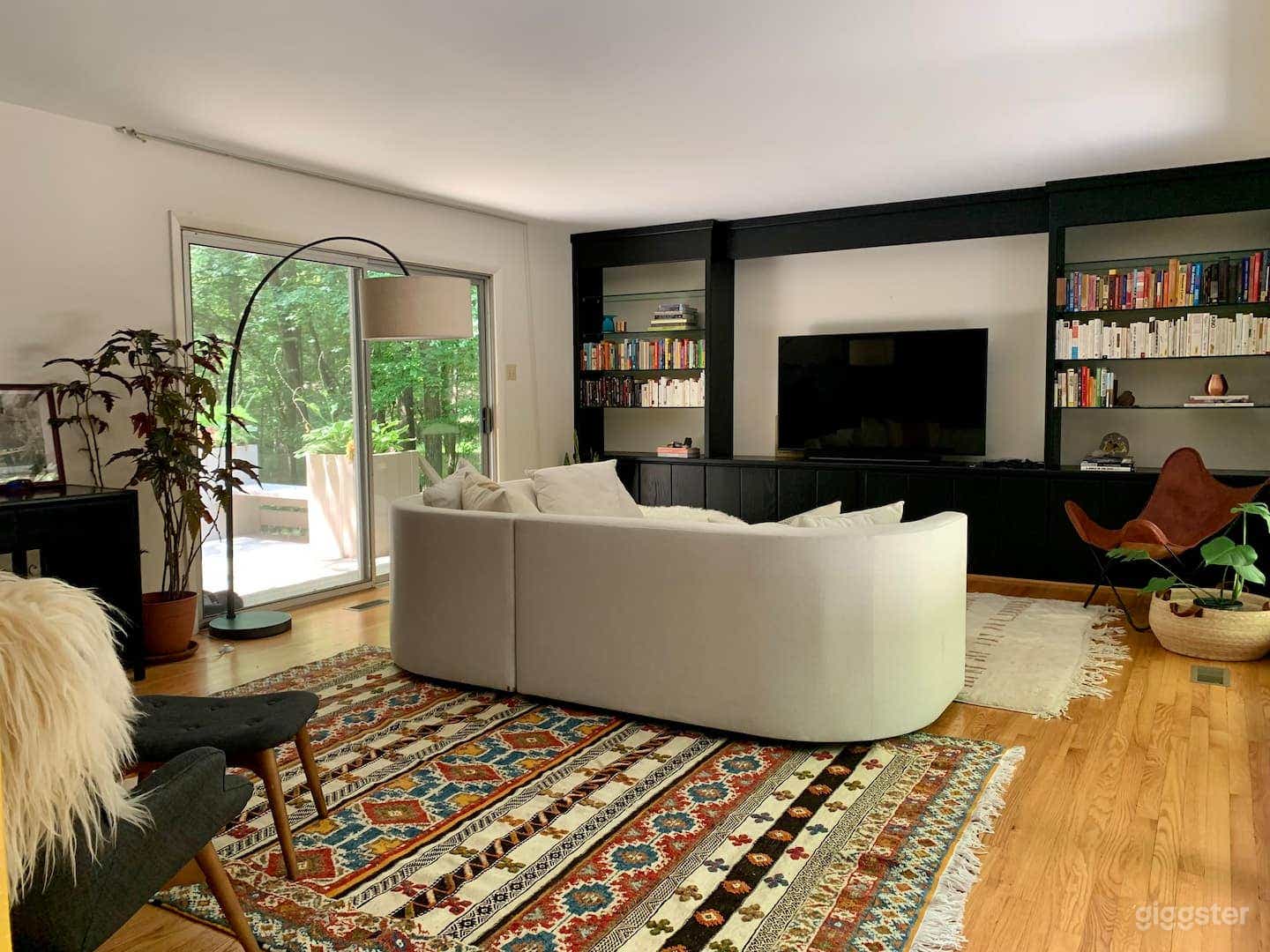 Surrounded by glass on both sides, the living room is the first room you'll encounter when you enter the house