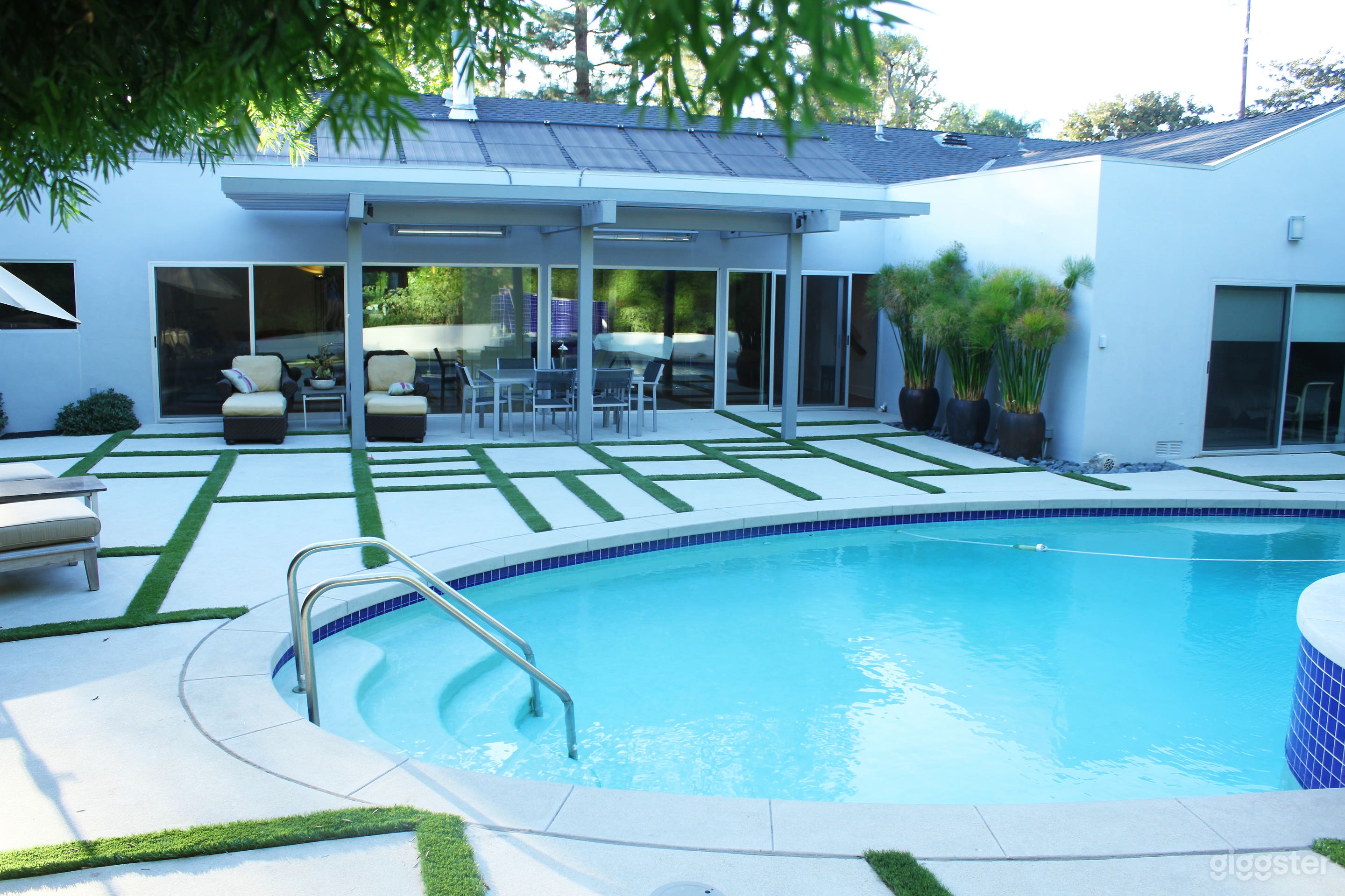 Pool area and view to house from the pool area