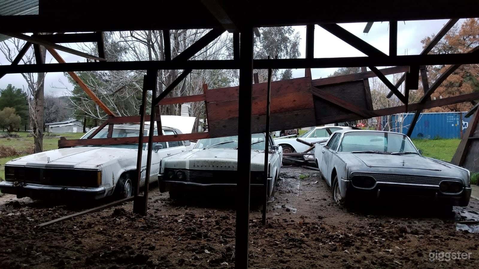 Abandoned cars and mechanic garage at Ranch Photo 2