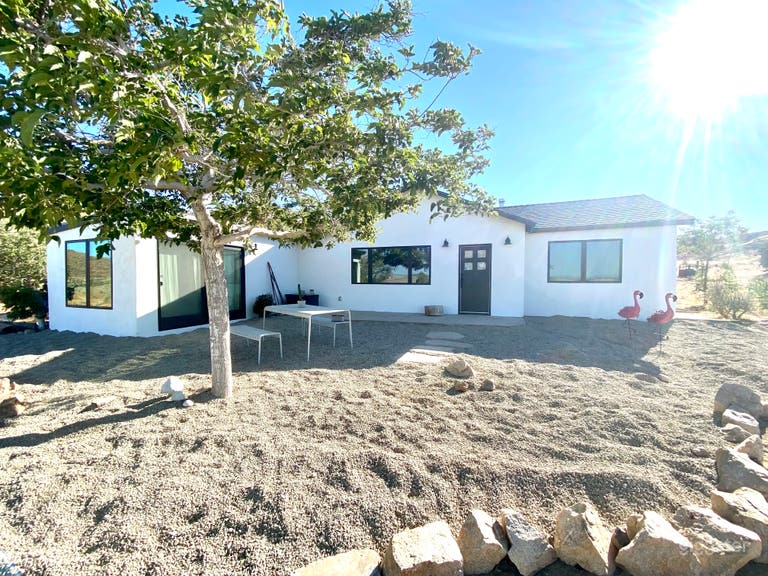  Exterior - Main house with gravel yard. 