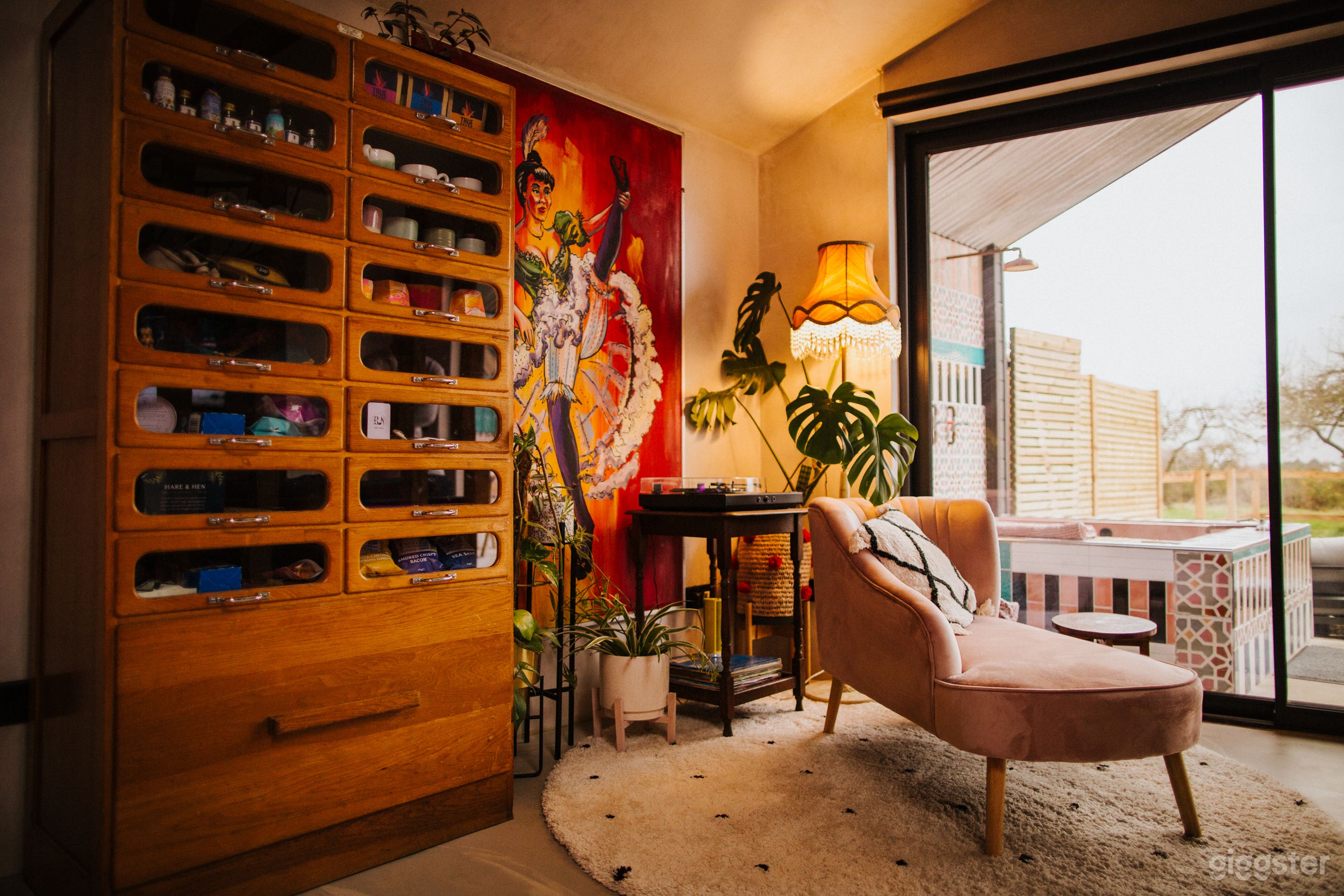 Floor to ceiling windows overlooking private gardens and English countryside